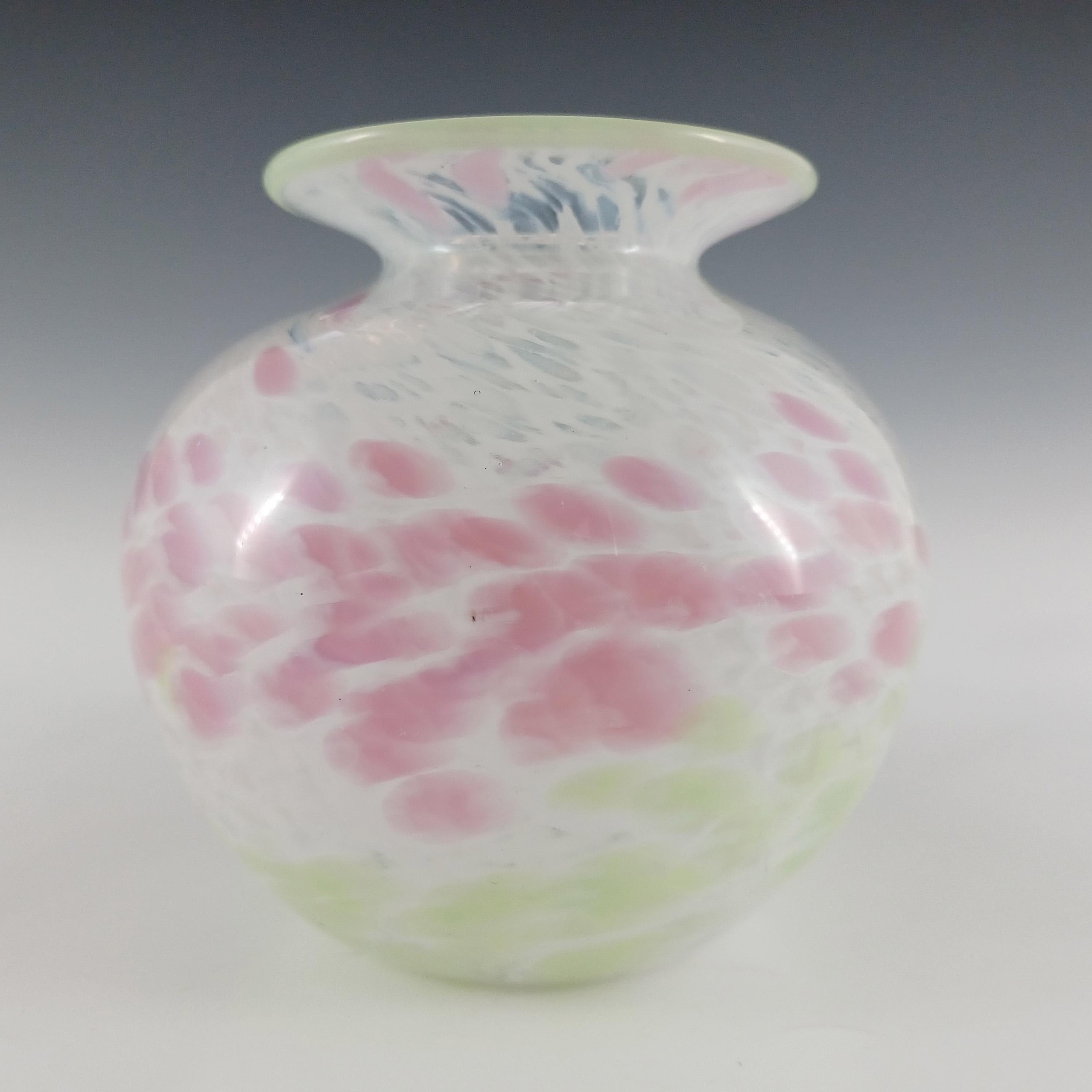 A beautiful pink, green and white speckled glass vase, made by Kerry Glass of Ireland. Bears a mirror image of the flame pontil mark to the base as was also used at Michaels Isle of Wight Studio. Kerry Glass was founded in Ireland in 1978 by Michael