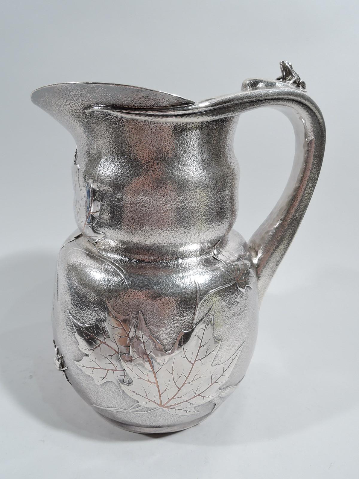 an american silver and mixed-metal pitcher