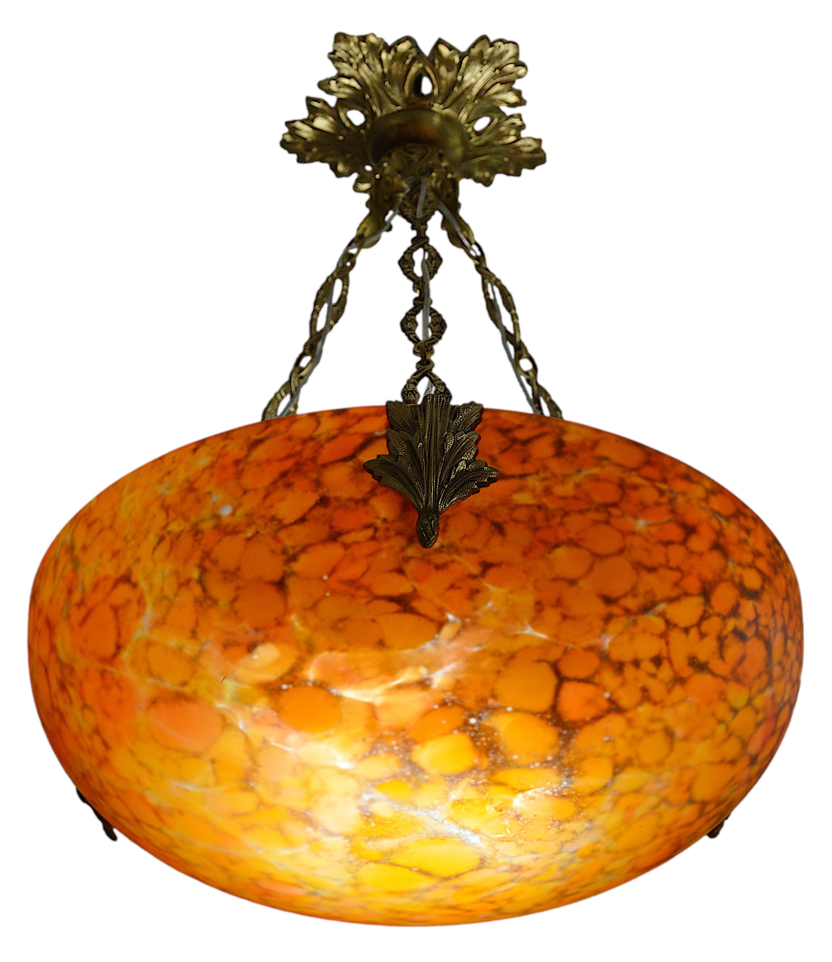 French Art Deco pendant chandelier by MARKHBEINN, 25-37, rue Sedaine, Paris, 11e, France, ca.1925. Glass shade hung on its bronze fixture. Height : 17