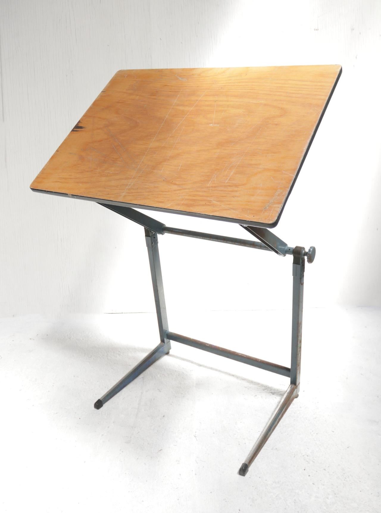 Marko Architect drafting table Dutch design from the 1960.
You can fold this table together or put it almost upright.
Beautiful patina and industrial look due to signs of wear.
Dimensions tabletop: 66 x 90.5 cm.