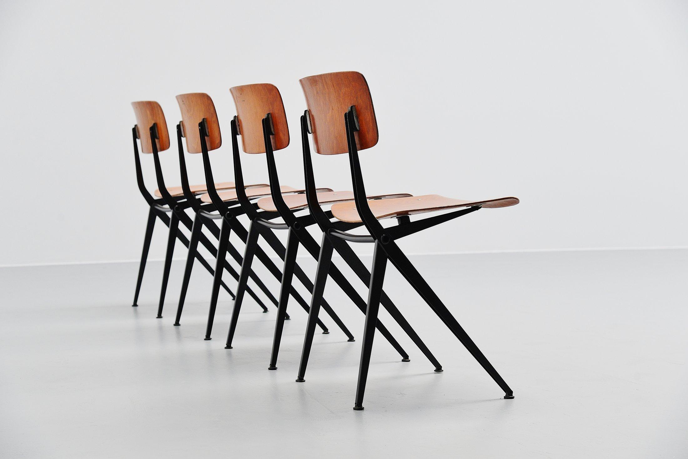 Very nice compass shaped industrial chairs designed by Ynske Kooistra and manufactured by Marko Holland 1970. Close to the designs by Friso Kramer and the quality is also very close. Nicely shaped chairs with black U-structural frame and pagwood