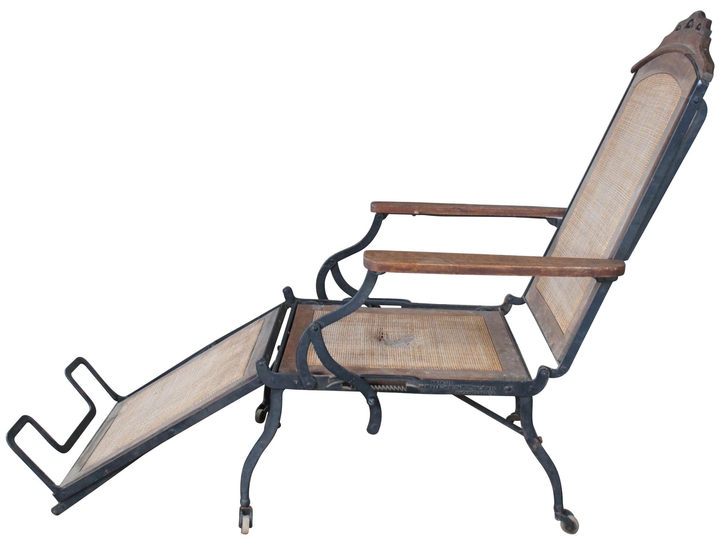 Marks Adjustable Folding Chair Company, campaign folding arm or lounge chair, circa 1877-97.  Made in New York from walnut and iron.  

folded close 28