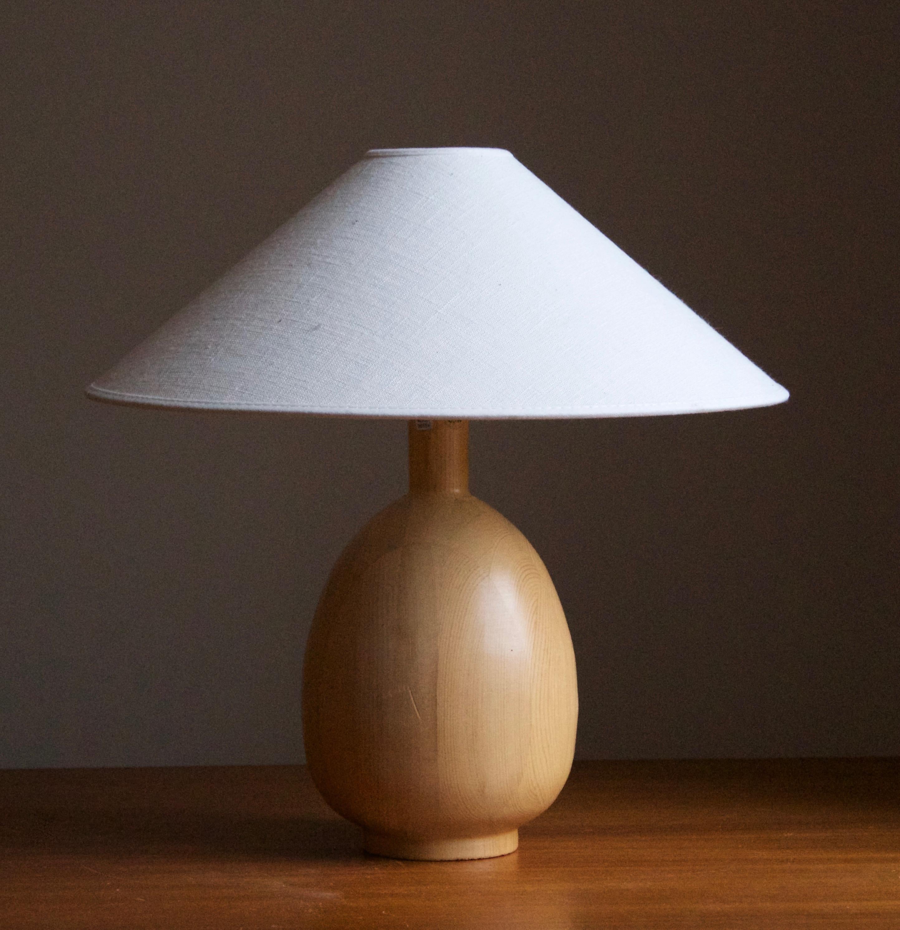 A pair of sizable table lamps. In solid pine. Produced by Markslöjd, Kinna, Sweden, c. 1970s-1980s.

Stated dimensions exclude lampshade. Height includes socket. Sold without lampshade.