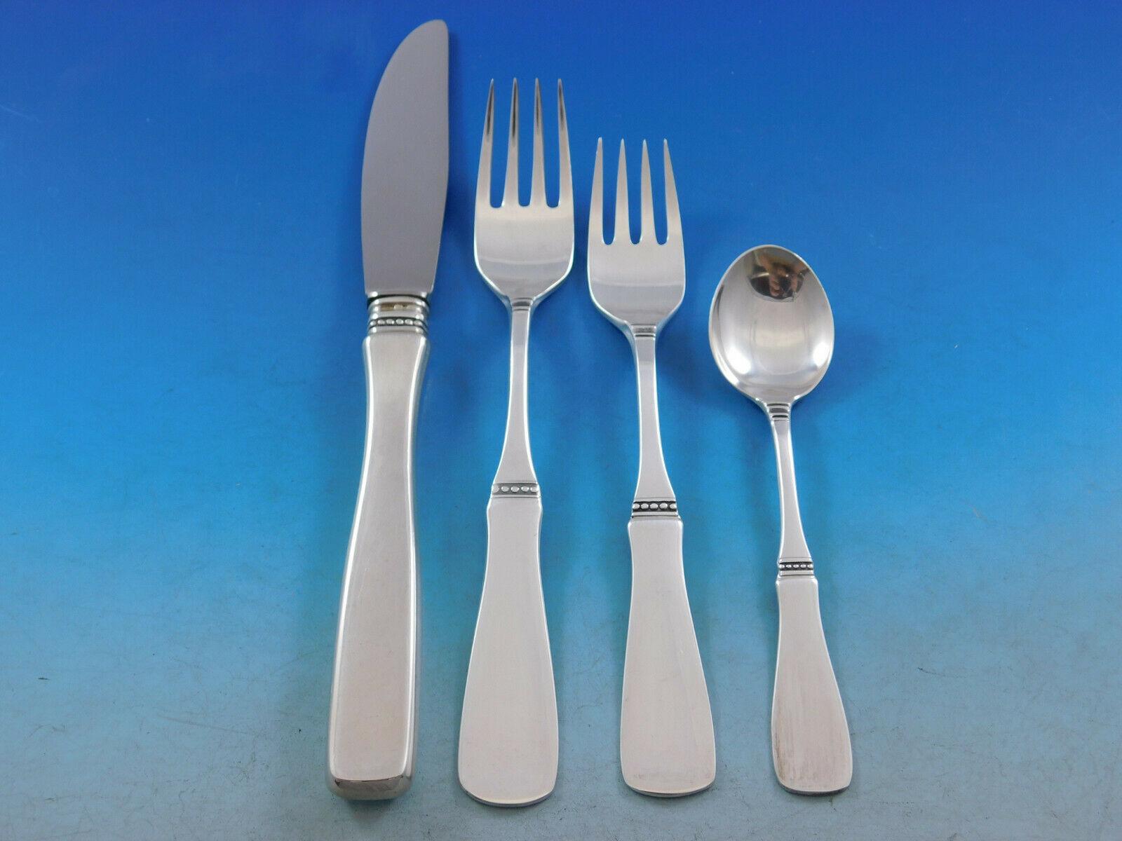 Lovely Uppsala by Mema, designed by Eric Lofman, Swedish 830 Silver Flatware set with bead detailing - 96 pieces. This set includes:


12 Knives w/stainless blades, 8 3/8