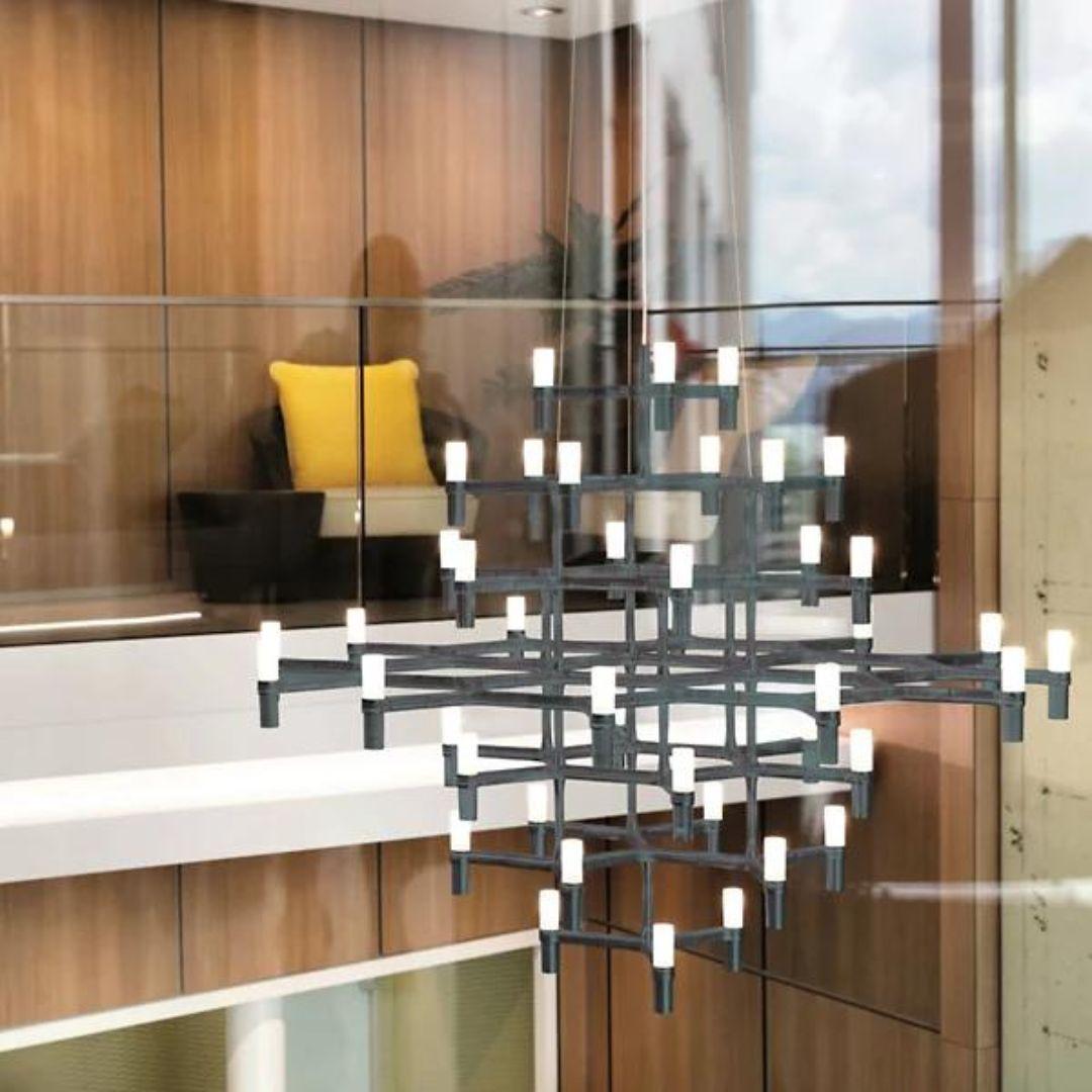 Jehs & Laub Crown Magnum chandelier for Nemo in matte black.

Expertly designed by Markus Jehs and Jürgen Laub this pendant chandelier's form is inspired by the uniqueness & individuality of nature's snow crystal. Featuring modular lamps and