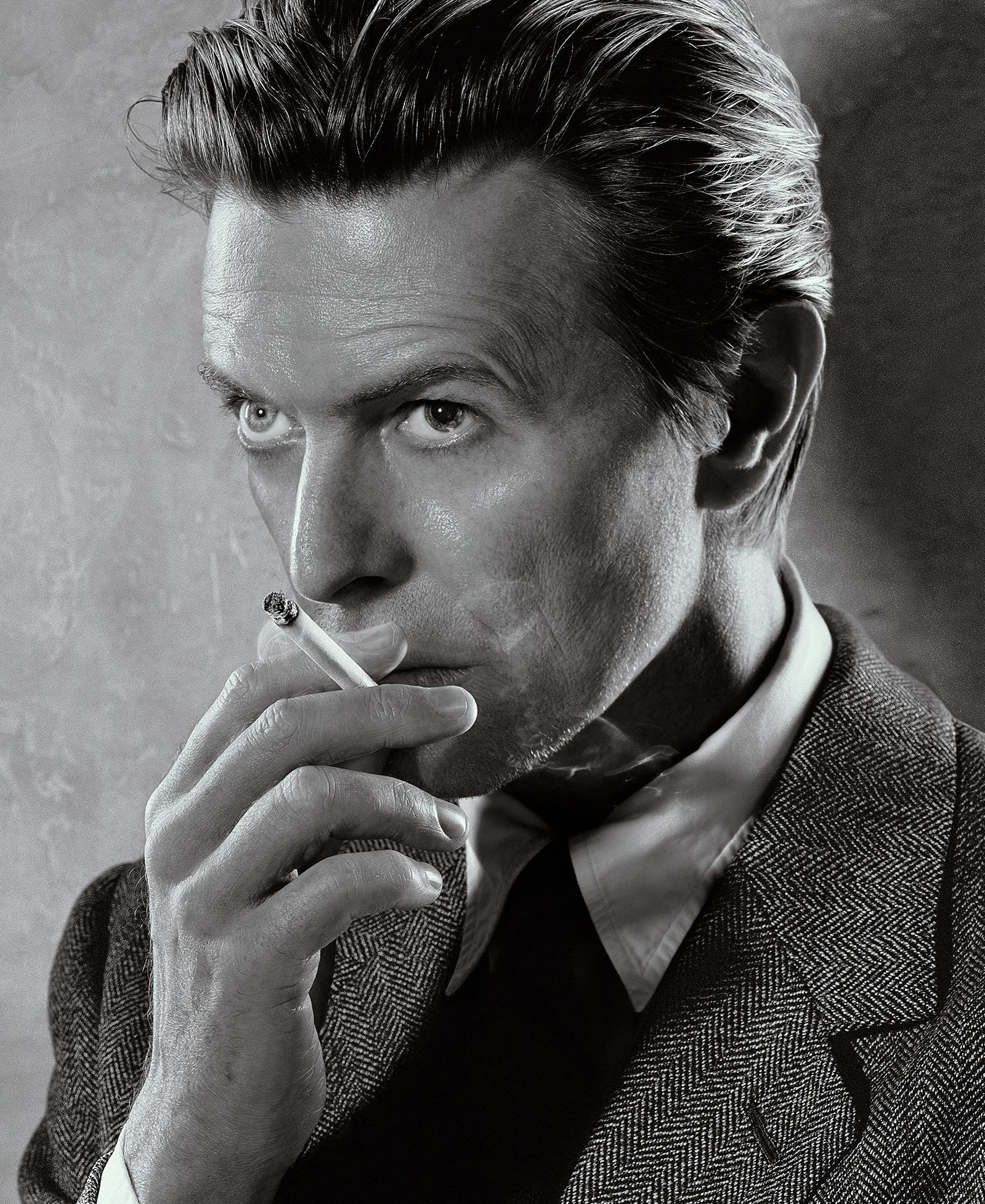 David Bowie, Smoking, Black & White - Photograph by Markus Klinko