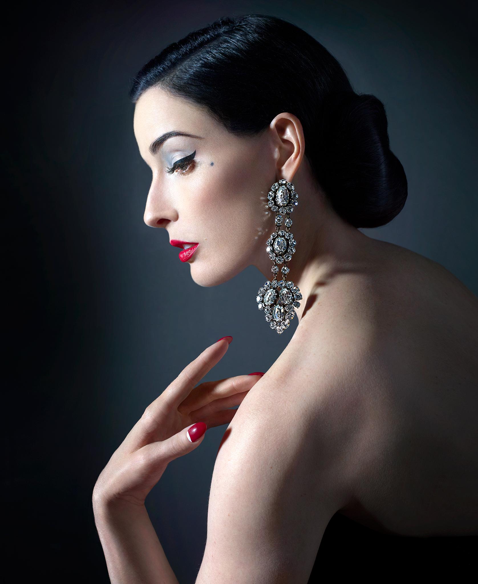 Museum quality fine art print of Dita Von Teese by photographer Markus Klinko in 2009 in Los Angeles.

This print is available in the following sizes, signed and numbered by Markus Klinko
24" high - Edition 50
40" high - Edition 25
60" high -