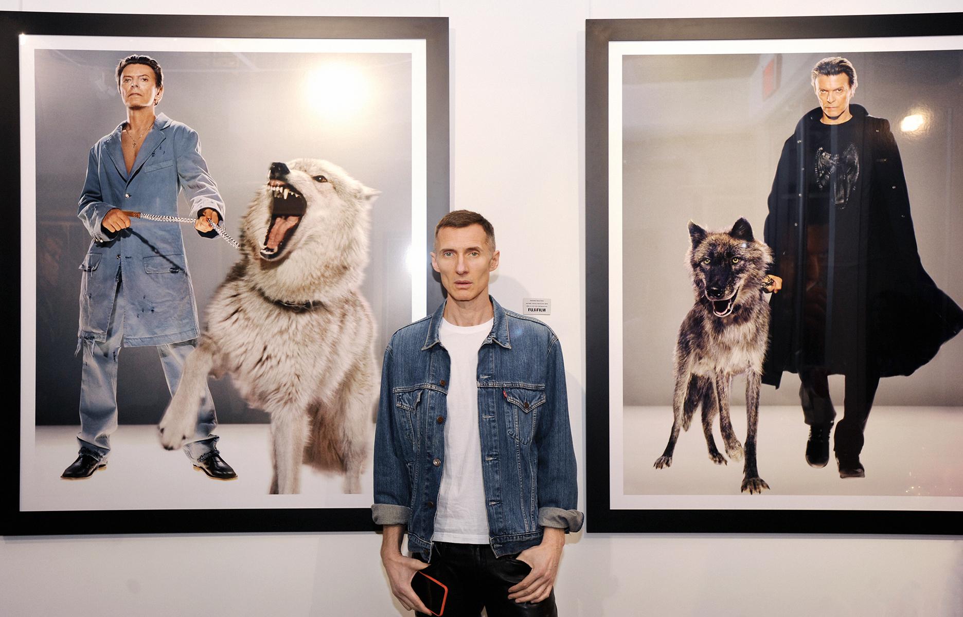 The Protector - superstar David Bowie in blue with roaring wolf - Photograph by Markus Klinko