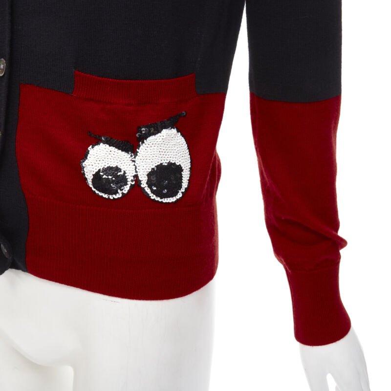 MARKUS LUPFER 100% merino wool black red Angry Eyes sequins pocket cardigan XS
Reference: ANWU/A00711
Brand: Markus Lupfer
Material: Wool
Color: Black, Red
Pattern: Solid
Closure: Button
Made in: China

CONDITION:
Condition: Excellent, this item was