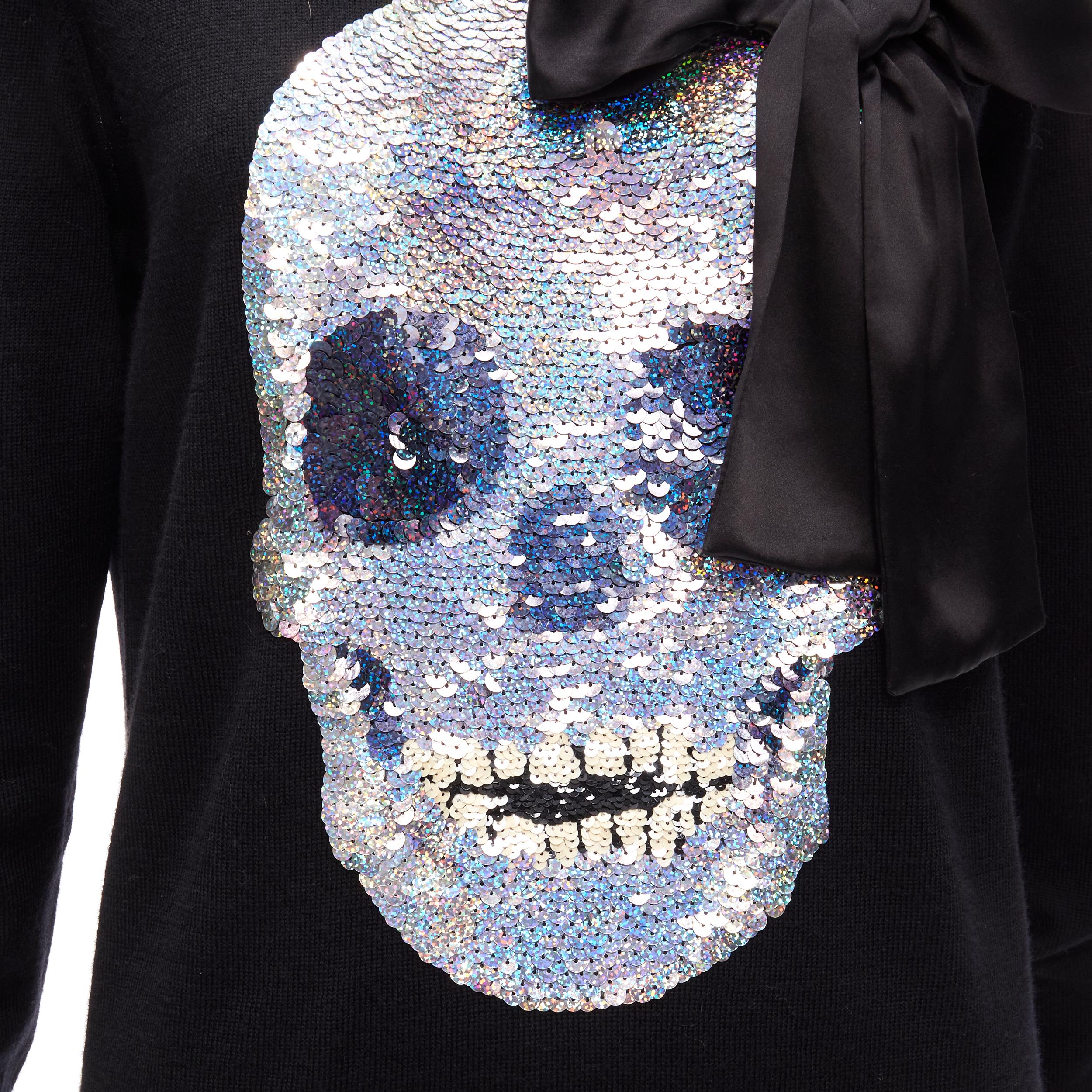 MARKUS LUPFER black holographic silver skull bow sweater S 
Reference: ANWU/A00710 
Brand: Markus Lupfer 
Material: Feels like wool 
Color: Black 
Pattern: Skull 
Extra Detail: Holographic silver skull sequins embellishment with black bow applique.
