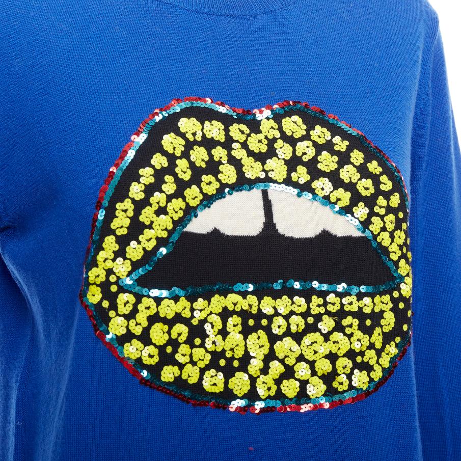 MARKUS LUPFER blue merino wool yellow sequin lip sweater S
Reference: WECN/A00038
Brand: Markus Lupfer
Material: Merino Wool
Color: Blue, Yellow
Pattern: Leopard
Closure: Pullover
Made in: China

CONDITION:
Condition: Very good, this item was