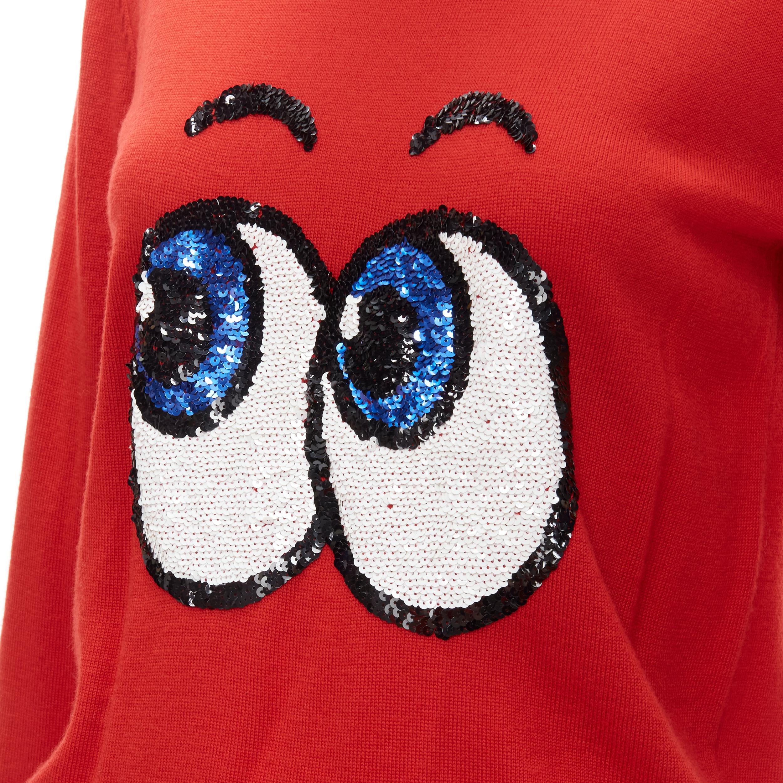 MARKUS LUPFER comic eyes sequins red pullover sweater XS
Brand: Markus Lupfer
Material: Feels like wool
Color: Red
Pattern: Solid

CONDITION:
Condition: Excellent, this item was pre-owned and is in excellent condition. Composition label