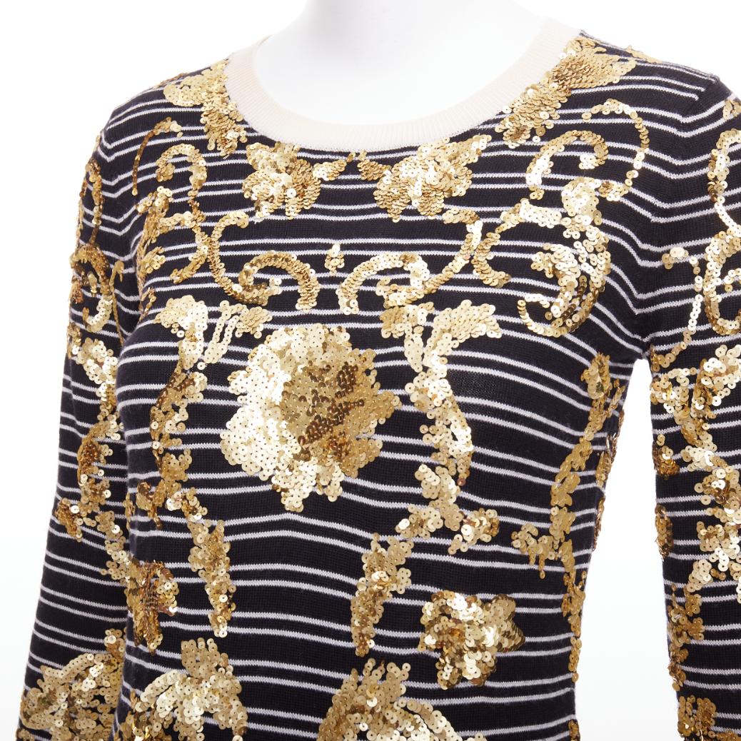MARKUS LUPFER gold sequins black 100% merino wool striped sweater dress S
Reference: NKLL/A00256
Brand: Markus Lupfer
Material: Merino Wool
Color: Black, Gold
Pattern: Striped
Closure: Slip On
Made in: China

CONDITION:
Condition: Excellent, this