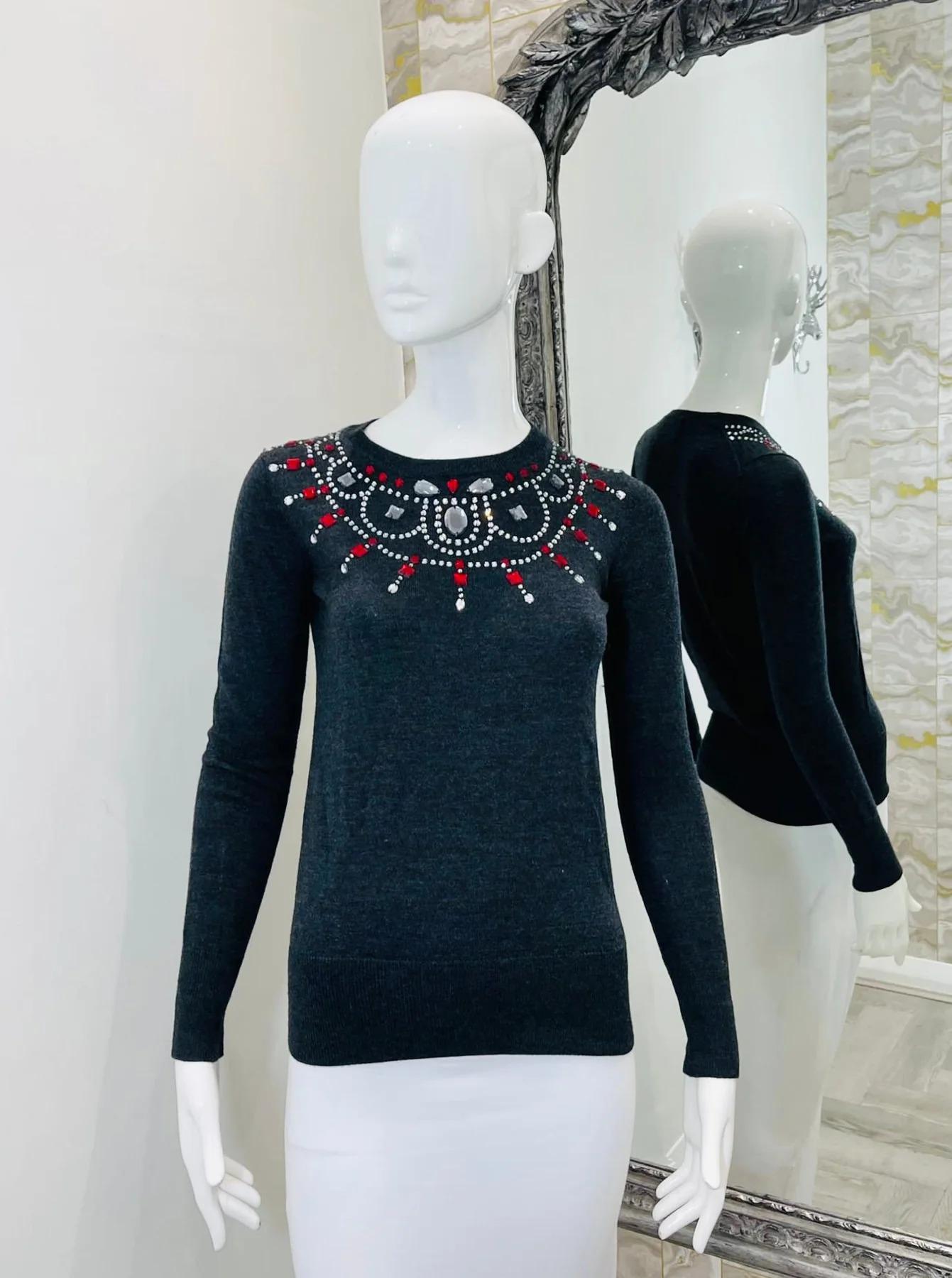 Markus Lupfer Merino Wool & Crystal Jumper

Dark grey knitted sweater with crystal/jewelled neckline.

Additional information:
Size – XS
Composition- Merino Wool, Crystal
Condition – Very Good