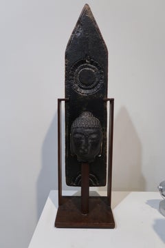 "Amber Arrow Buddha, " pigmented sand-cast glass sculpture, forged metal base