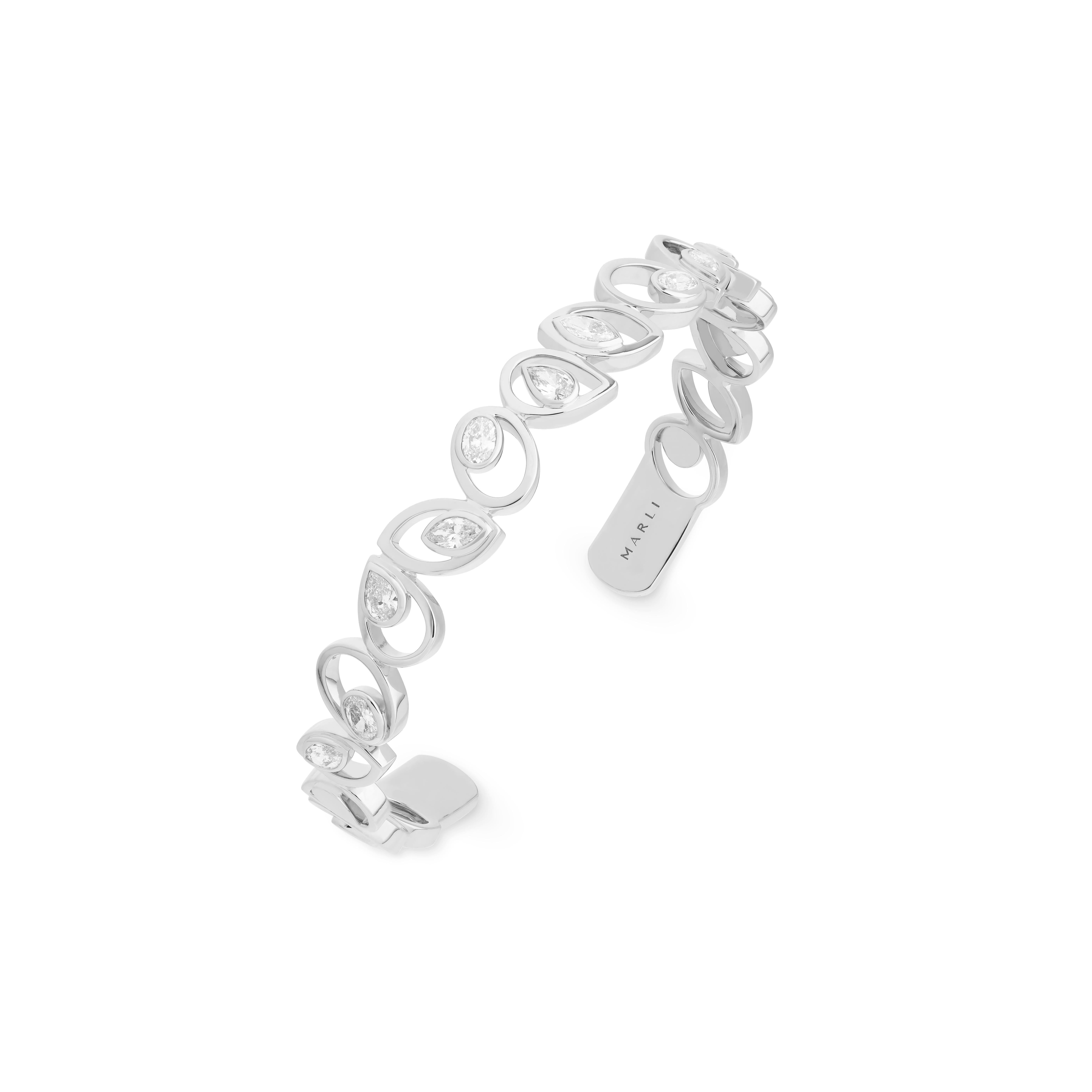 The Rock Multi-Shape Statement Bracelet is a perfect addition for a contemporary lifestyle. Designed with awe-inspiring brilliant-cut diamonds, this bracelet evokes a youthful, yet sensual vibe. Inspired by the playful flavor of rock candy treats,