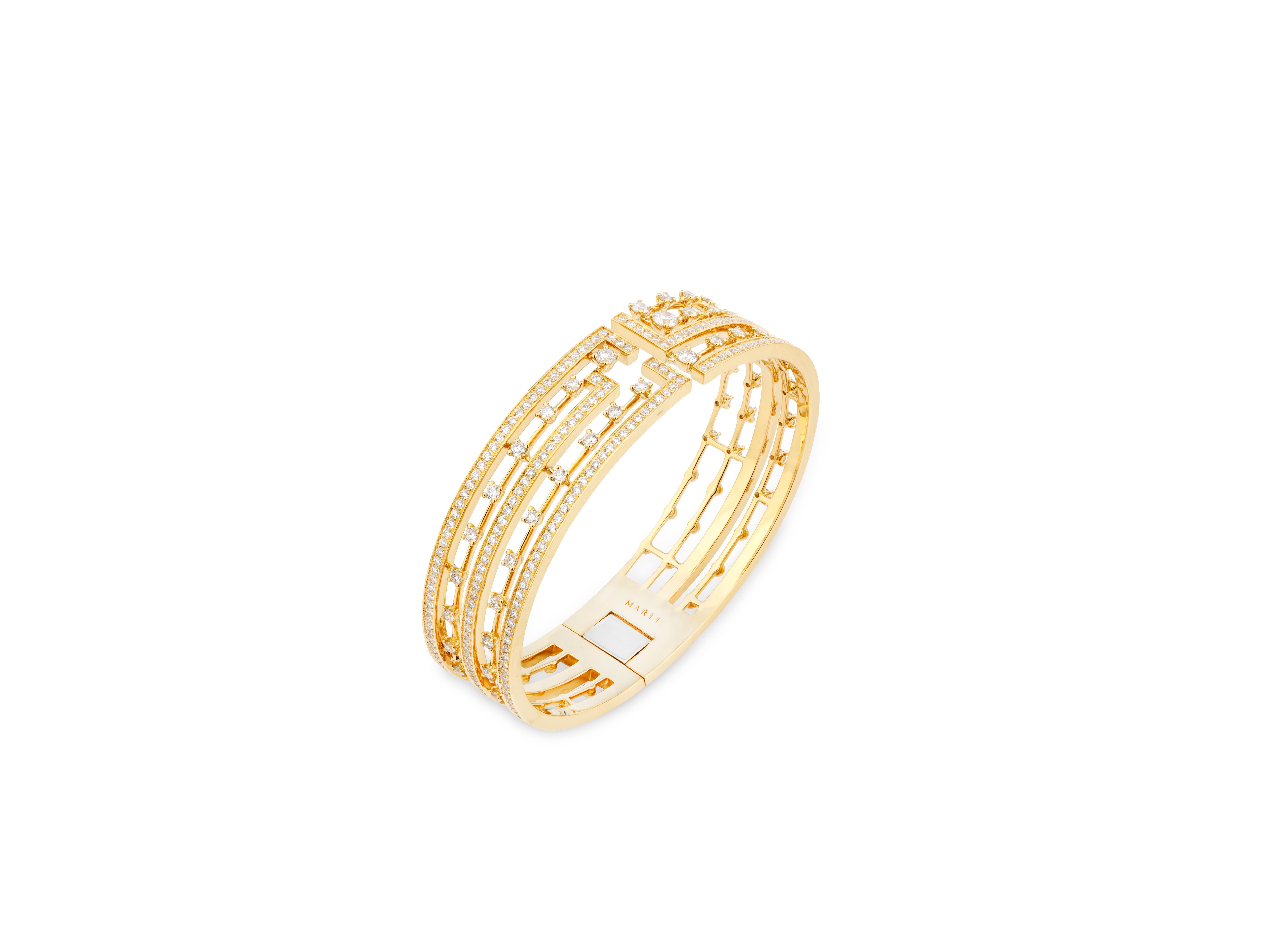 Dotted with diamonds in a gridlock pattern, the Avenues Hinged Cuff “Superior” emulates Manhattan’s busy streets. Crafted in 18K white, rose, or yellow gold and brilliant cut diamonds, this powerful cuff is hinged to form a comfortable fit. This