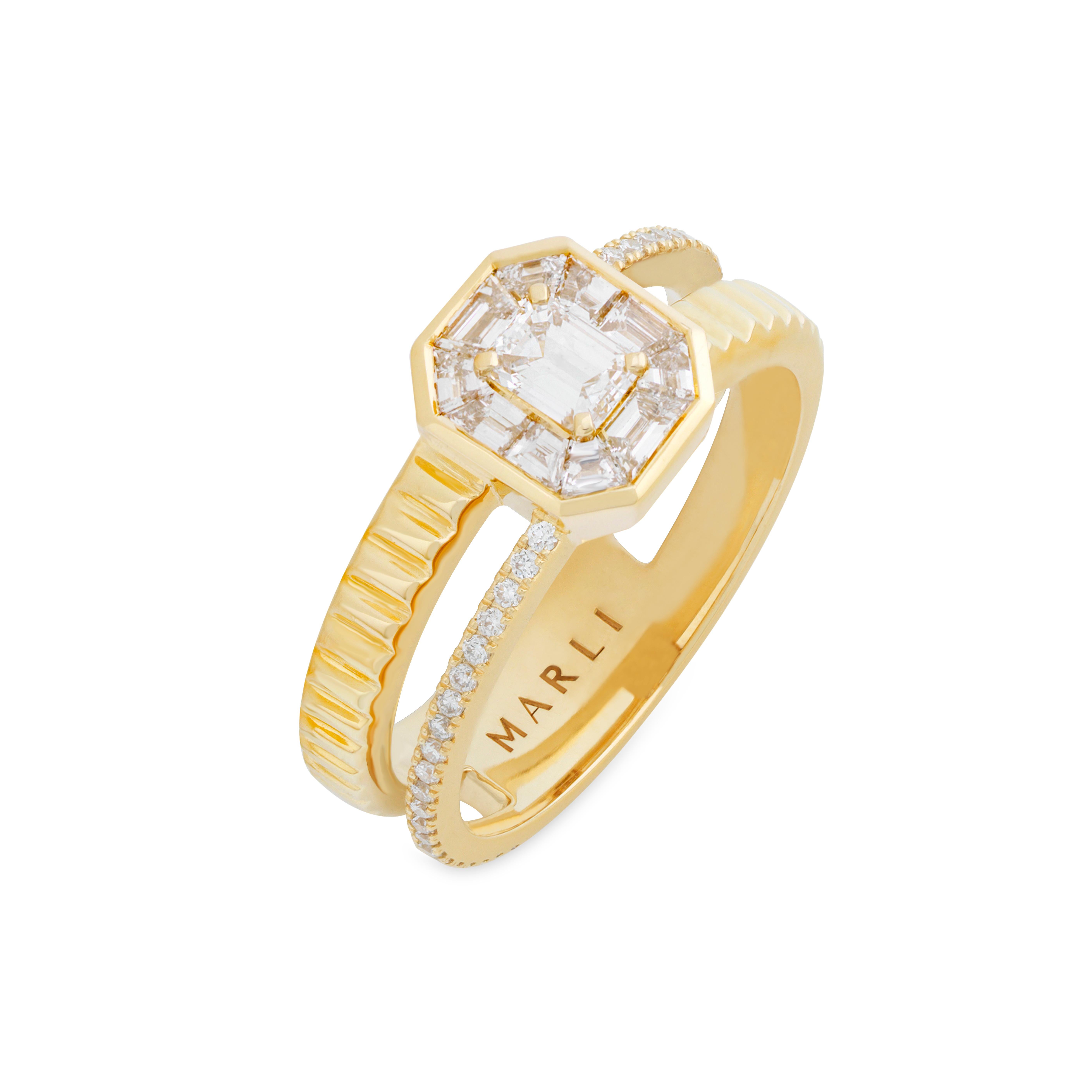 Suggesting the opulence and geometry of the Art Deco era, the Deco Rectangle Ring adds a contemporary touch of minimalism. Two parallel lanes of ridged 18K white, rose, or yellow gold converge and connect with an emerald cut diamond center that is