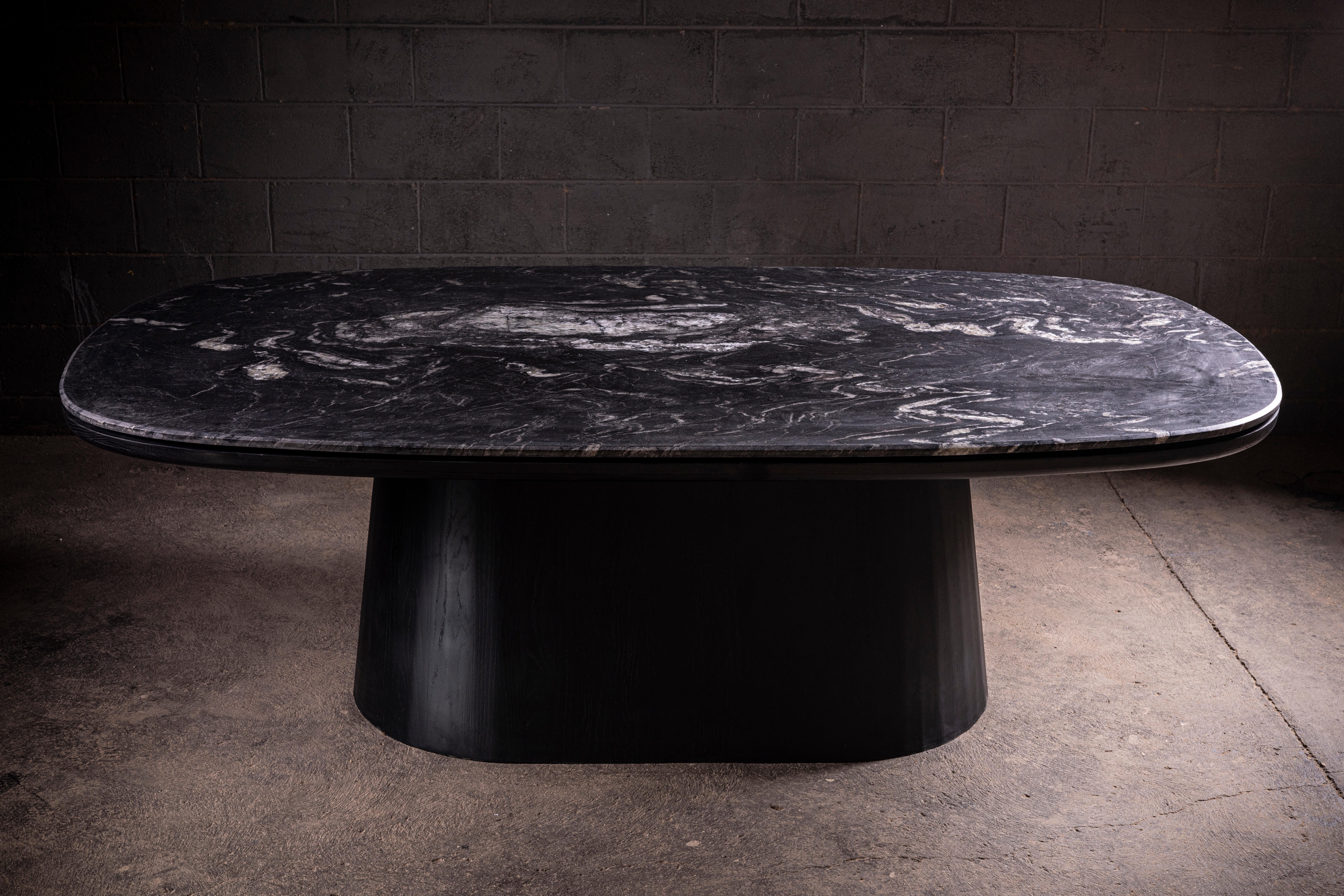 Floating Black Marble Dining Table Top with a Black Matte Solid Oak Base.