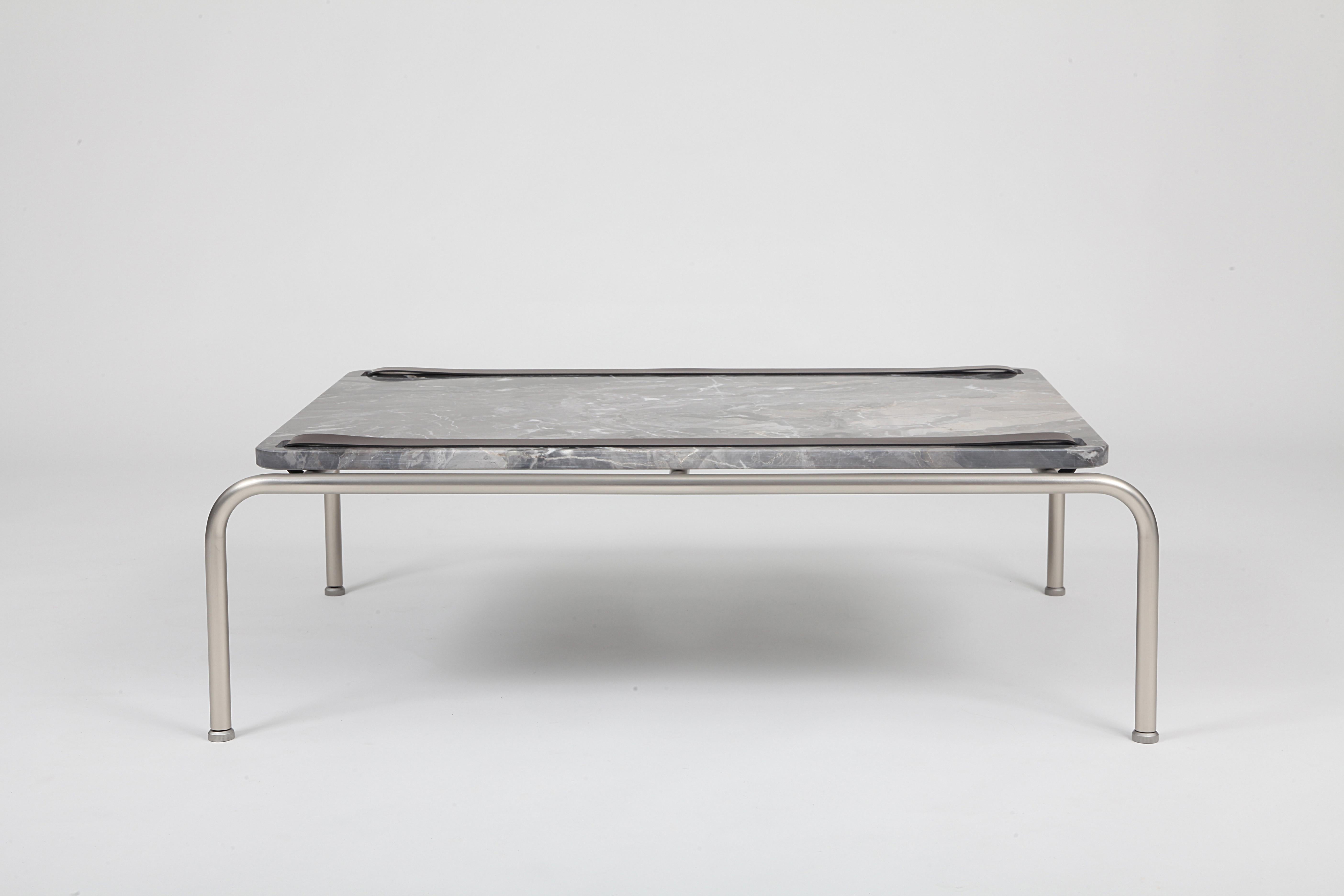 Marmorino Dover White Marble Coffee Table by Dalmoto
Dimensions: D 66 x W 92 x H 28 cm.
Materials: Nichel Marino nickel, Dover White marble and leather.

Available in different metal, marble and leather options. Available in two sizes. Please