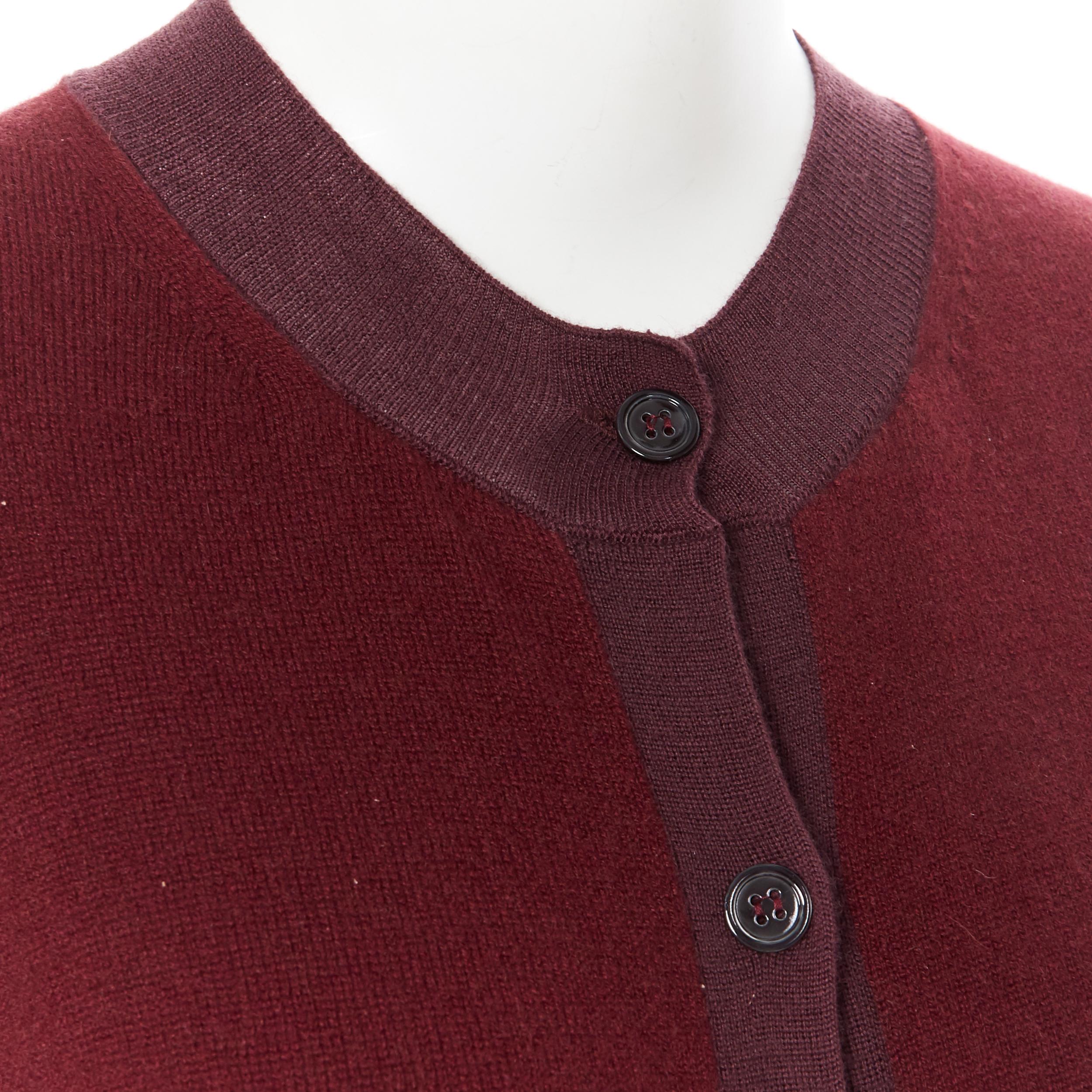 MARNI 100% cashmere burgundy colorblocked cardigan sweater IT38 
Reference: LNKO/A01278 
Brand: Marni 
Material: Cashmere 
Color: Burgundy 
Pattern: Solid 
Closure: Button 
Made in: Spain 

CONDITION: 
Condition: Very good, this item was pre-owned