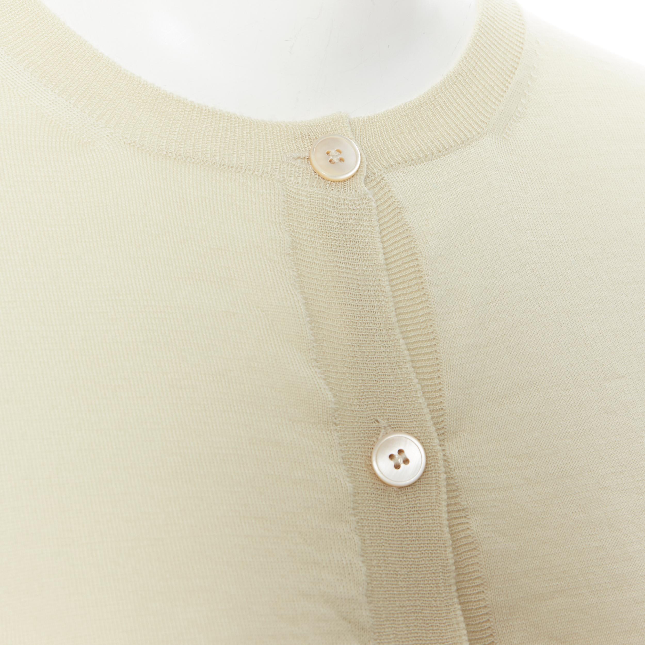 MARNI 100% cachemire giallo pallido con bottoni madreperlati, maglione cardigan IT38
Marchio: Marni
Nome del modello / Stile: Cardigan in cashmere
Materiale: Cashmere
Colore: giallo
Modello: Tinta unita
Chiusura: bottone
Dettaglio extra: Cardigan in
