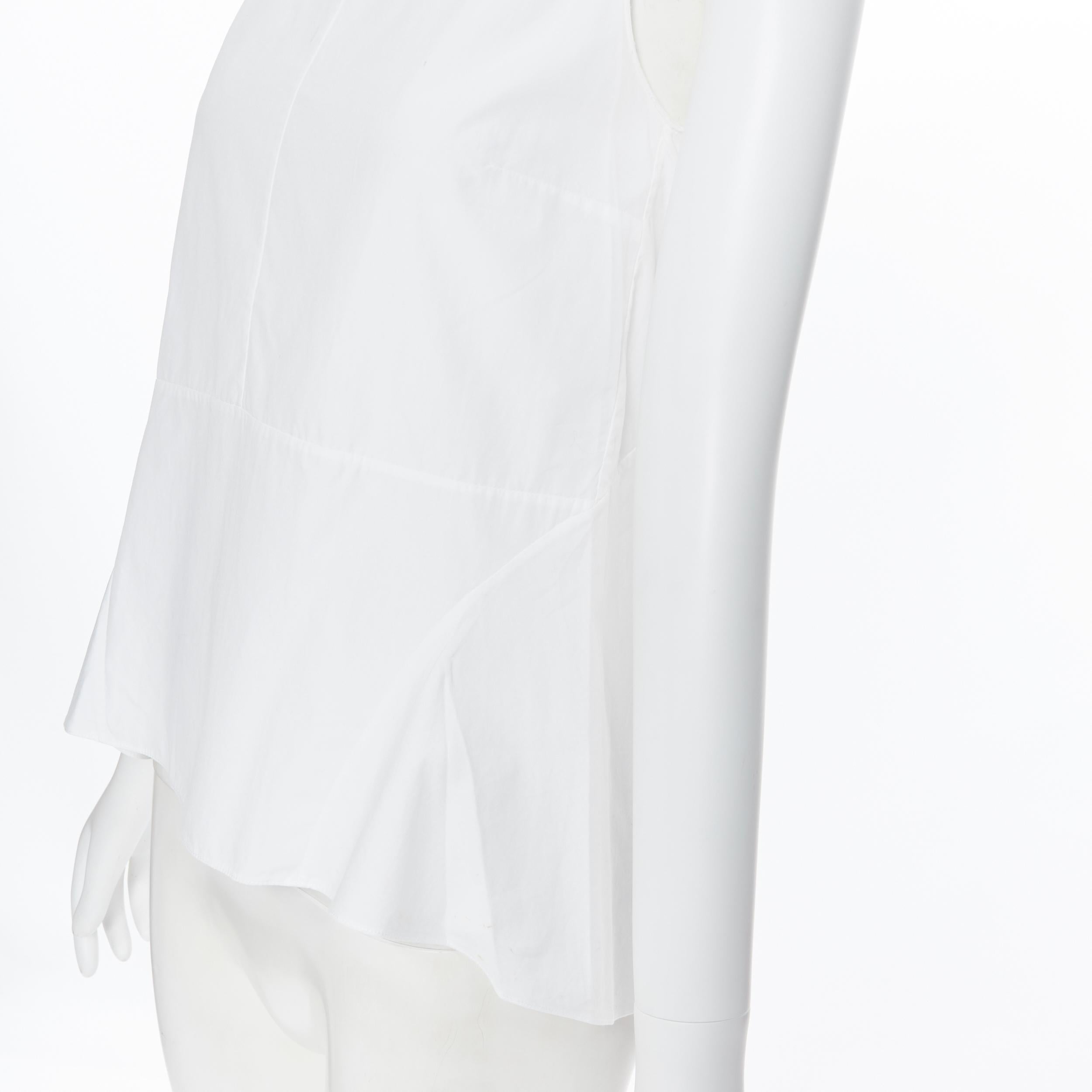 MARNI 100% cotton white curved seam flared hem sleeveless top IT38 XS
Brand: Marni
Model Name / Style: Cotton top
Material: Cotton
Color: White
Pattern: Solid
Closure: Zip
Extra Detail: Curved seams at front. High low flared hem. Sleeveless. Round