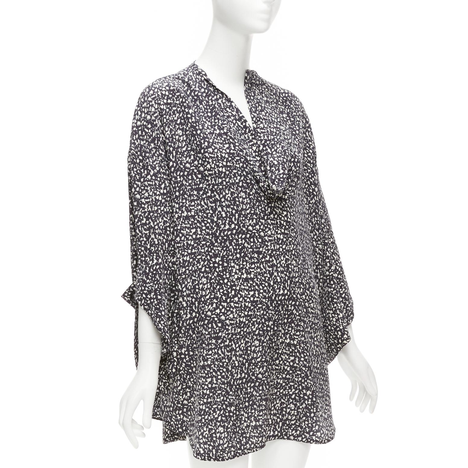 MARNI 100% silk black white speckle print asymmetric neck shirt dress IT40 S
Reference: CELG/A00416
Brand: Marni
Material: Silk
Color: Black, White
Pattern: Abstract
Closure: Pullover
Extra Details: Adjustable cuffs.
Made in: