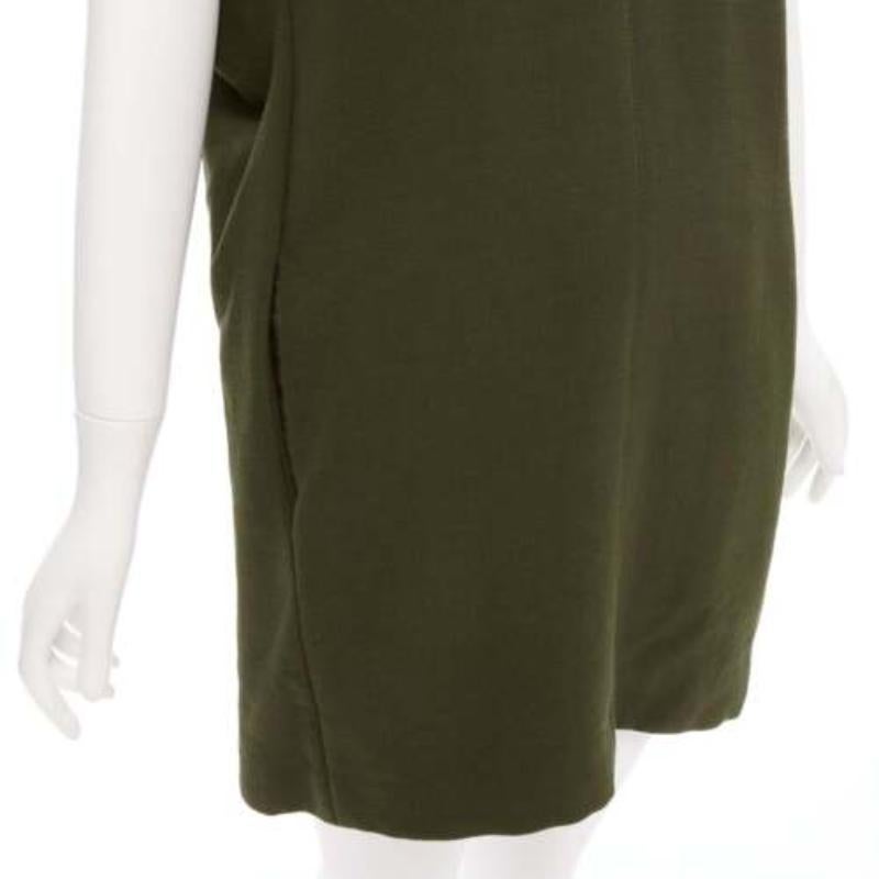 MARNI 100% virgin wool olive silk lined V neck boxy mini dress IT40 S
Reference: CELG/A00279
Brand: Marni
Material: Virgin Wool
Color: Khaki
Pattern: Solid
Closure: Slip On
Lining: Green Silk
Extra Details: Boxy square cut. Fully lined.
Made in: