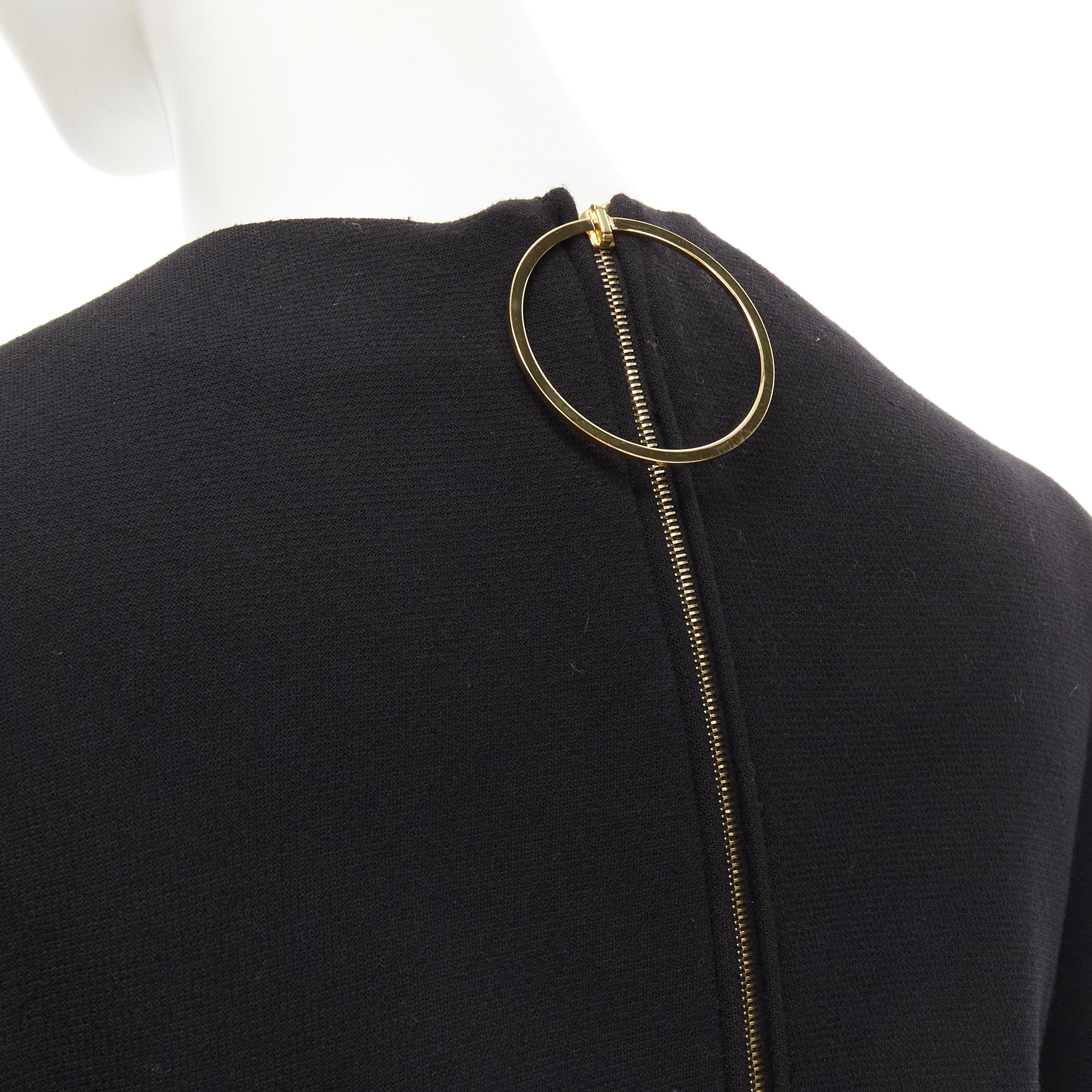 MARNI 100% wool crepe black curved hem boxy cocoon top IT38 XS 
Reference: AEMA/A00059 
Brand: Marni 
Material: Wool 
Color: Black 
Pattern: Solid 
Closure: Zip 
Extra Detail: Gold-tone ring zipper pull. Boxy cocoon fit. Cropped front. 
Made in: