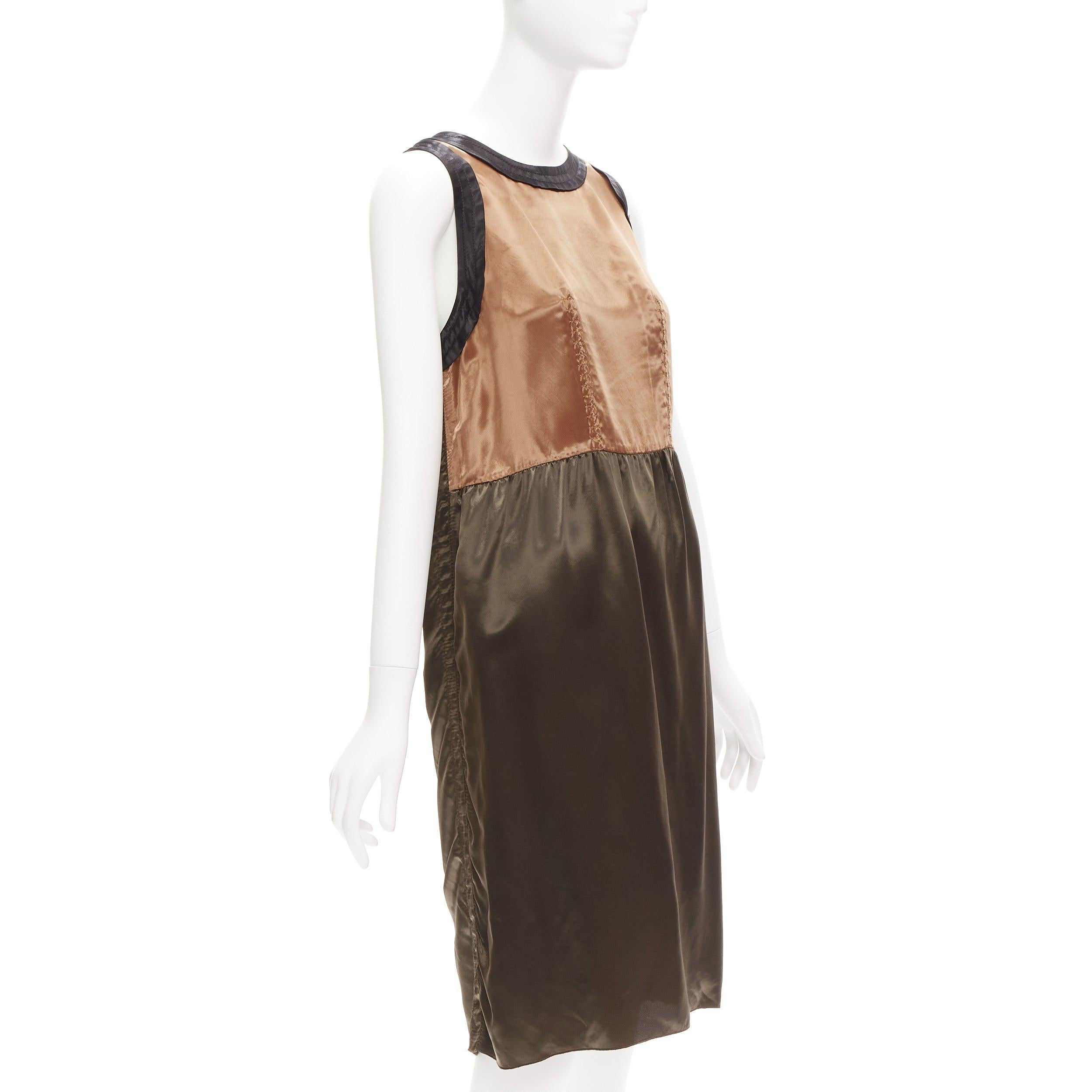 MARNI 2011 bronze brown satin colorblocked sleeveless dress IT40 S
Reference: CELG/A00277
Brand: Marni
Collection: 2011 Winter Collection
Material: Cupro
Color: Khaki, Brown
Pattern: Solid
Closure: Zip
Extra Details: Back zip.
Made in: