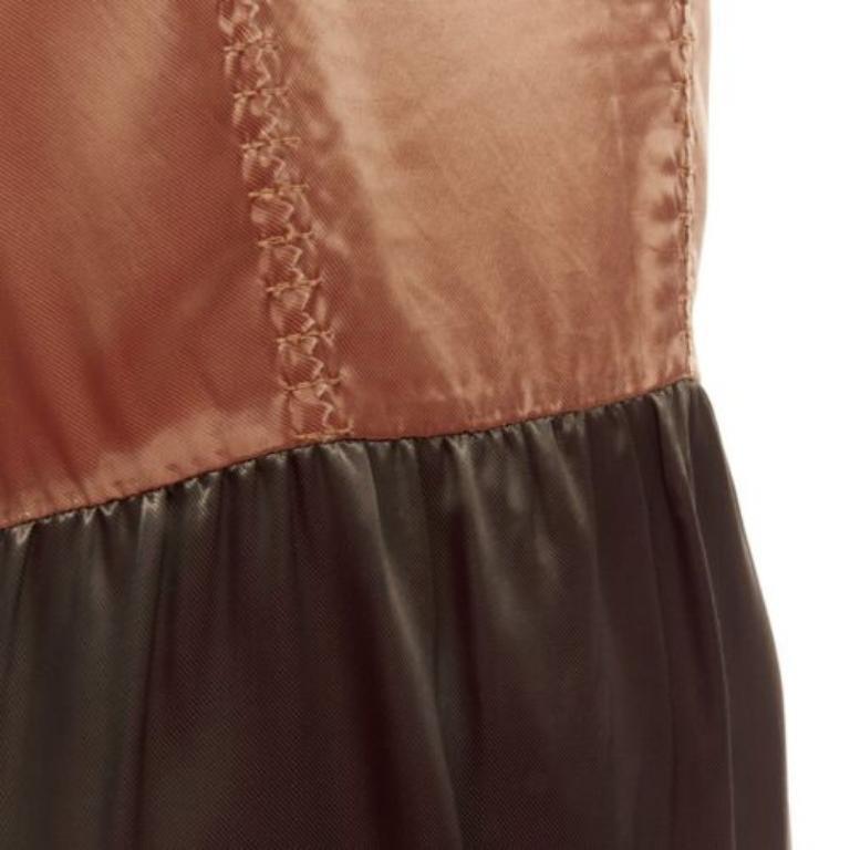 MARNI 2011 bronze brown satin colorblocked sleeveless dress IT40 S
Reference: CELG/A00277
Brand: Marni
Collection: 2011 Winter Collection
Material: Cupro
Color: Khaki, Brown
Pattern: Solid
Closure: Zip
Extra Details: Back zip.
Made in: