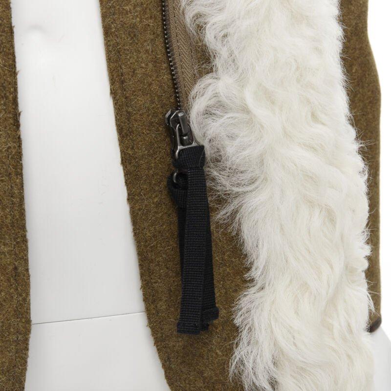 MARNI 2011 cream lamb shearling fur brown wool sleeves winter coat IT38 XS
Reference: CELG/A00058
Brand: Marni
Collection: Fall Winter 2011
Material: Fur, Wool
Color: Beige, Brown
Pattern: Solid
Closure: Zip
Lining:  Suede
Extra Details: Dual zip