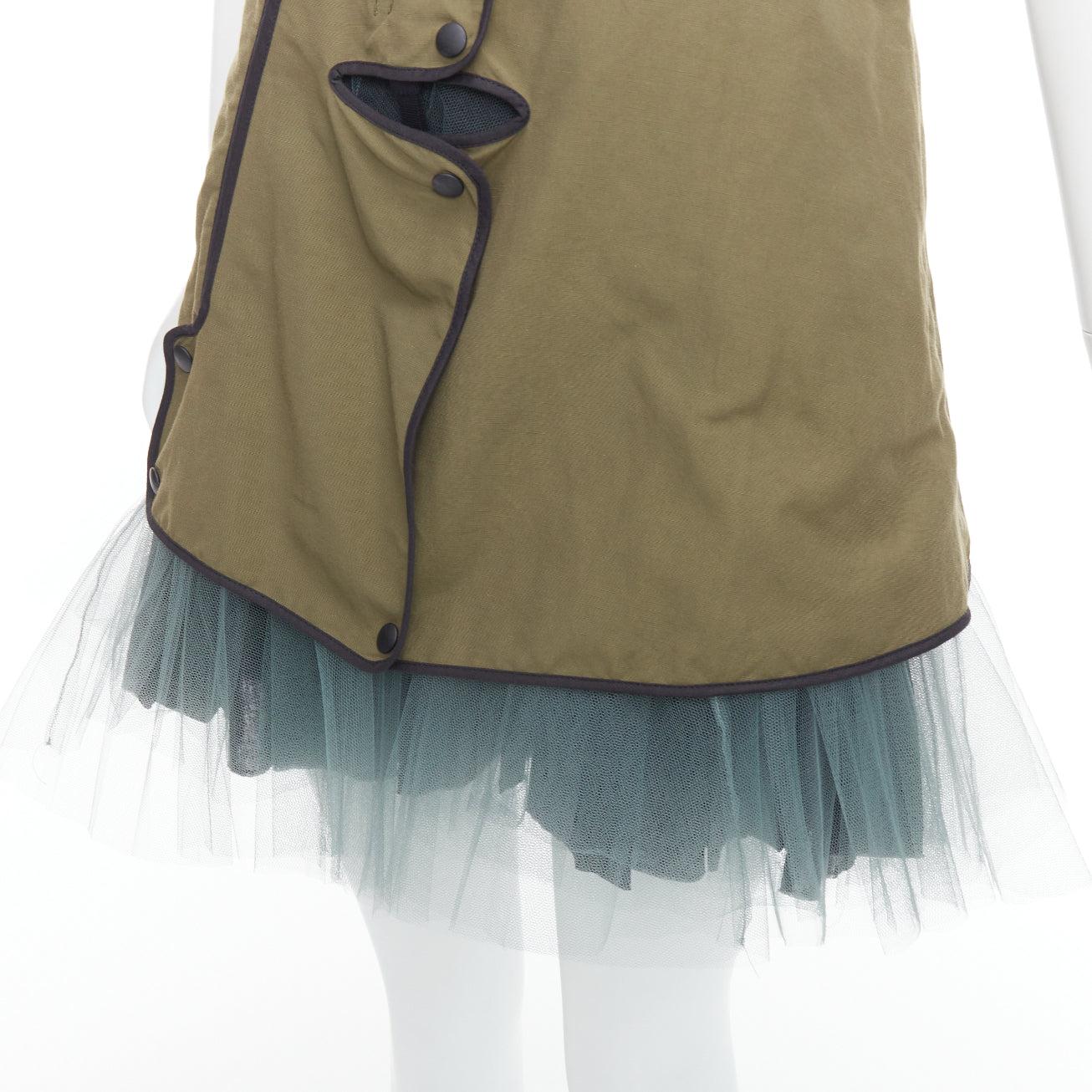 MARNI 2011 khaki utility cutout vest green tulle hem mini dress IT36 XXS
Reference: MECG/A00022
Brand: Marni
Collection: 2011
Material: Polyamide
Color: Khaki, Green
Pattern: Solid
Closure: Snap Buttons
Lining: Black Fabric
Made in: