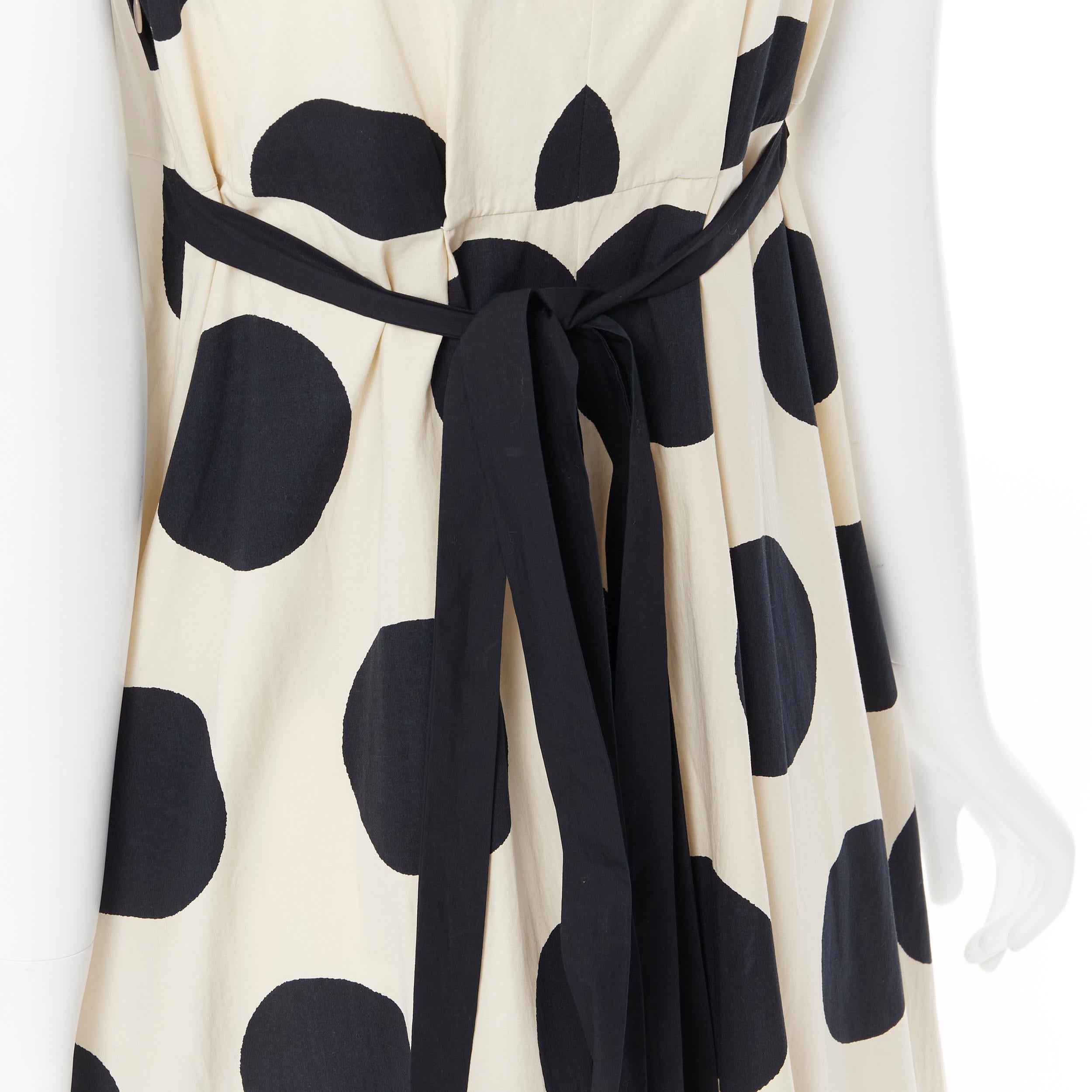 MARNI 2014 cream black oversize polka dot tie back casual maxi summer dress FR40 Reference: AEMA/A00024 
Brand: Marni 
Collection: Spring Summer 2014 
Material: Cotton 
Color: Beige 
Pattern: Polka Dot 
Closure: Zip 
Extra Detail: Scoop neck. Tie