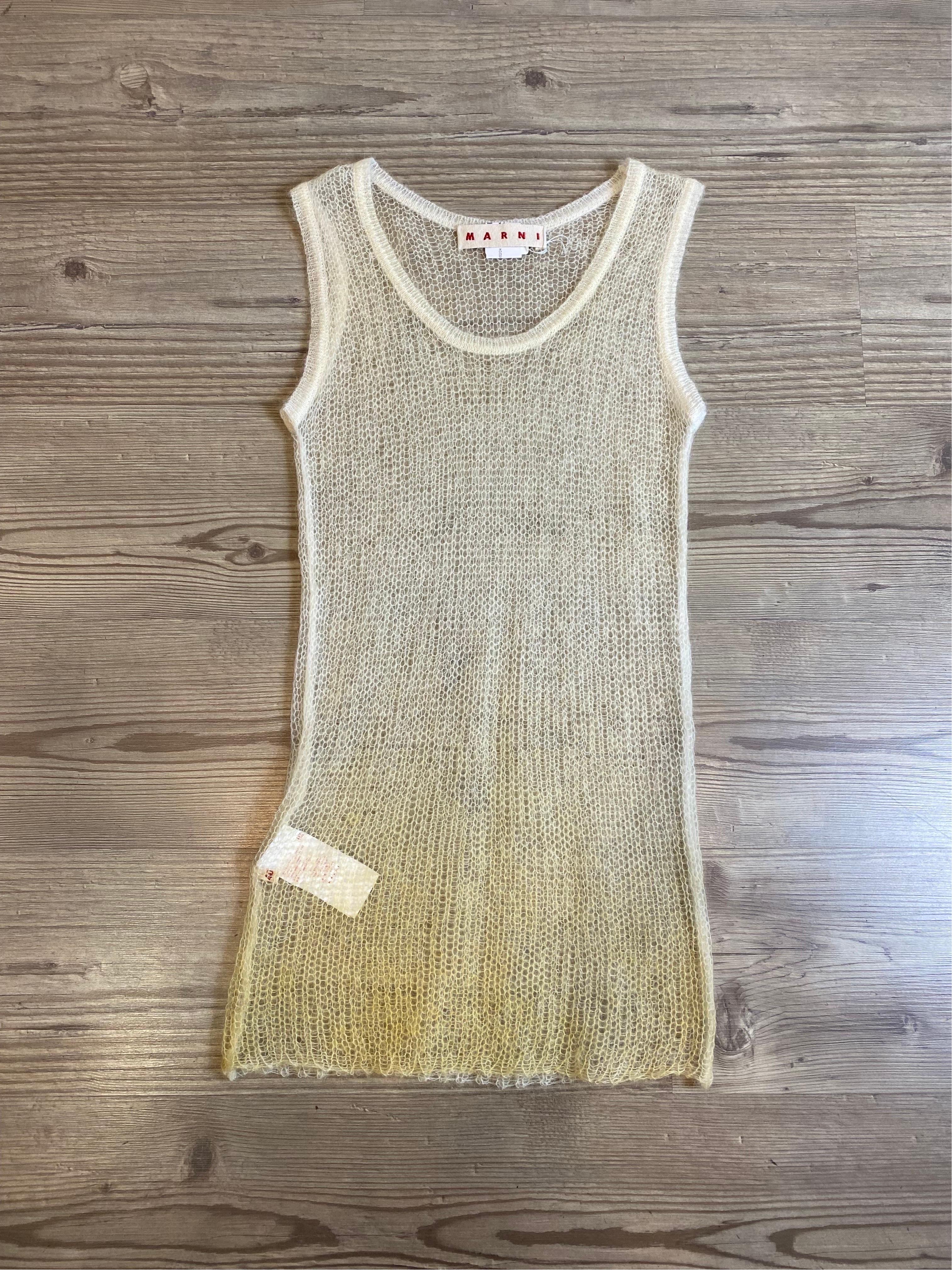 Marni net vest.
2019 collection.
In mohair, polyamide and wool. Very delicate.
Yellow shade on the bottom.
Italian size 40
Bust 38 cm
Length 80 cm
Like new, never worn.