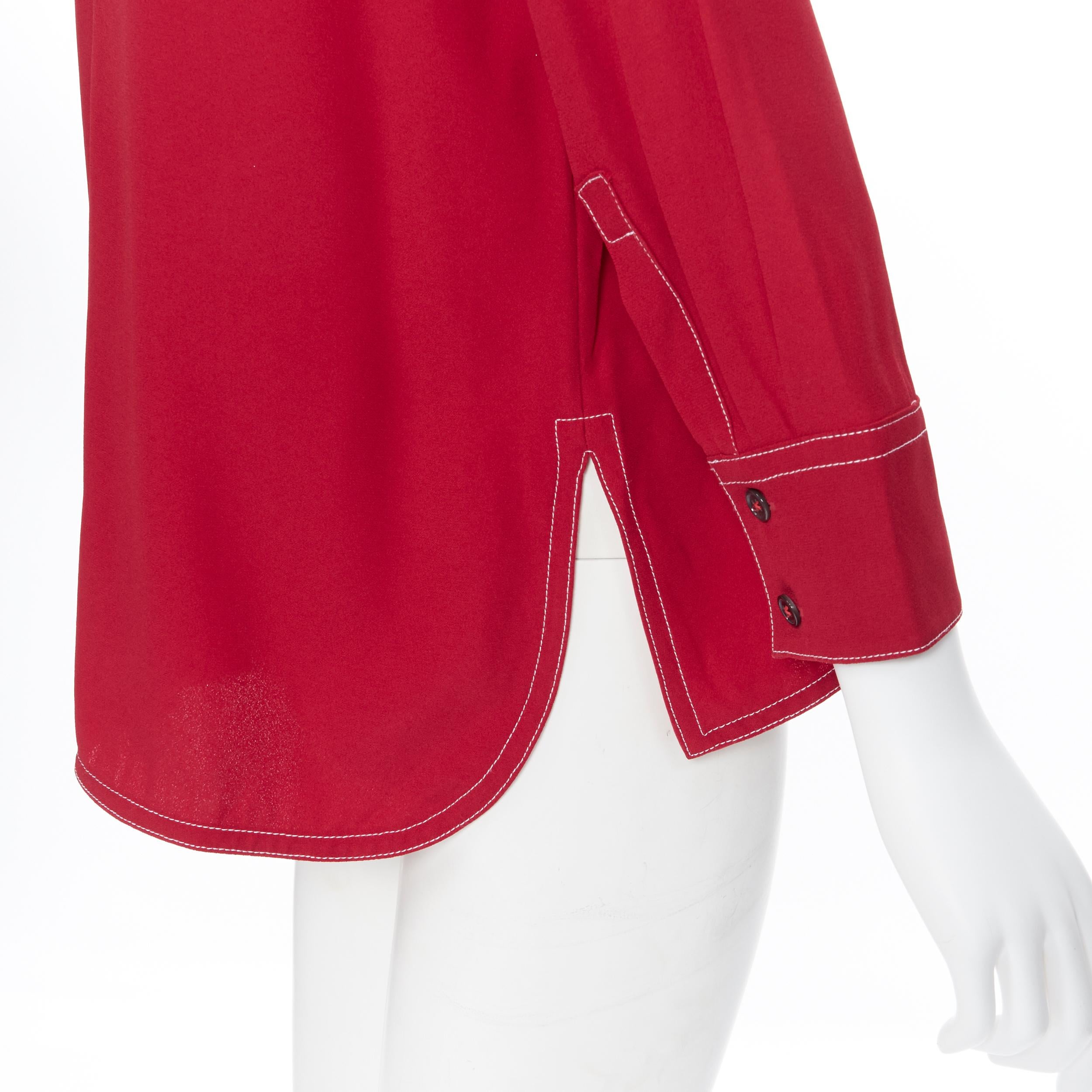 MARNI 2019 viscose acetate red white overstitched V-neck blouse top IT42 M
Brand: Marni
Model Name / Style: Blouse top
Material: Viscose, acetate
Color: Red
Pattern: Solid
Extra Detail: V-neck. Overstitching detail.
Made in: Italy

CONDITION: