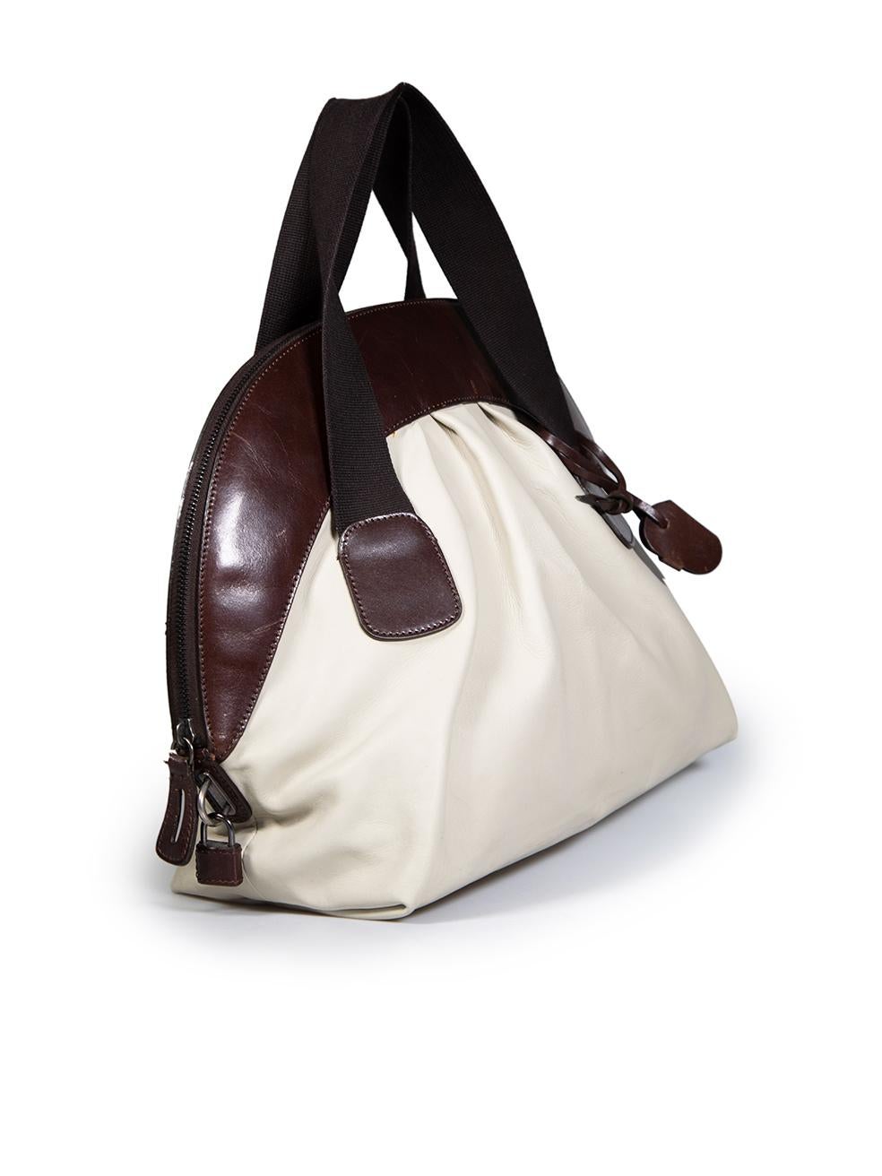 CONDITION is Good. General wear to bag is evident. Moderate signs of wear to the front, back and base, with some scratches to the leather trims on this used Marni designer resale item.
 
 
 
 Details
 
 
 Beige
 
 Leather
 
 Medium handbag
 
 Brown
