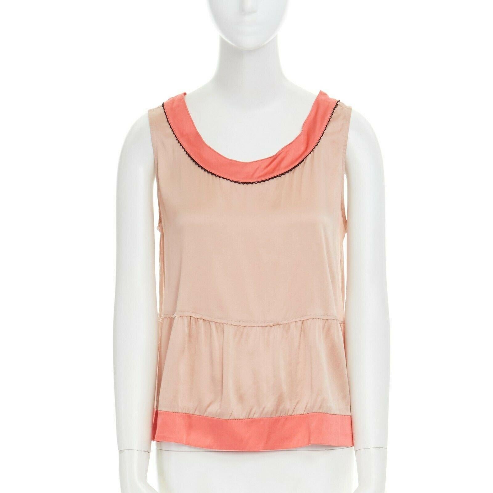 MARNI beige silk blend pink trimmed scoop neck babydoll flared top Sz. 1 S
Brand: Marni
Model Name / Style: Silk top
Material: Silk, elastane
Color: Beige
Pattern: Solid
Closure: Pull on
Extra Detail: Scooped neck. Babydoll flared hem. Sleeveless.