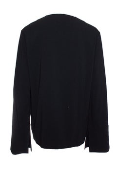 Marni, Black blouse with bow and flutter sleeves.