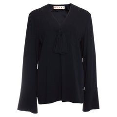 Marni, Black blouse with bow and flutter sleeves.