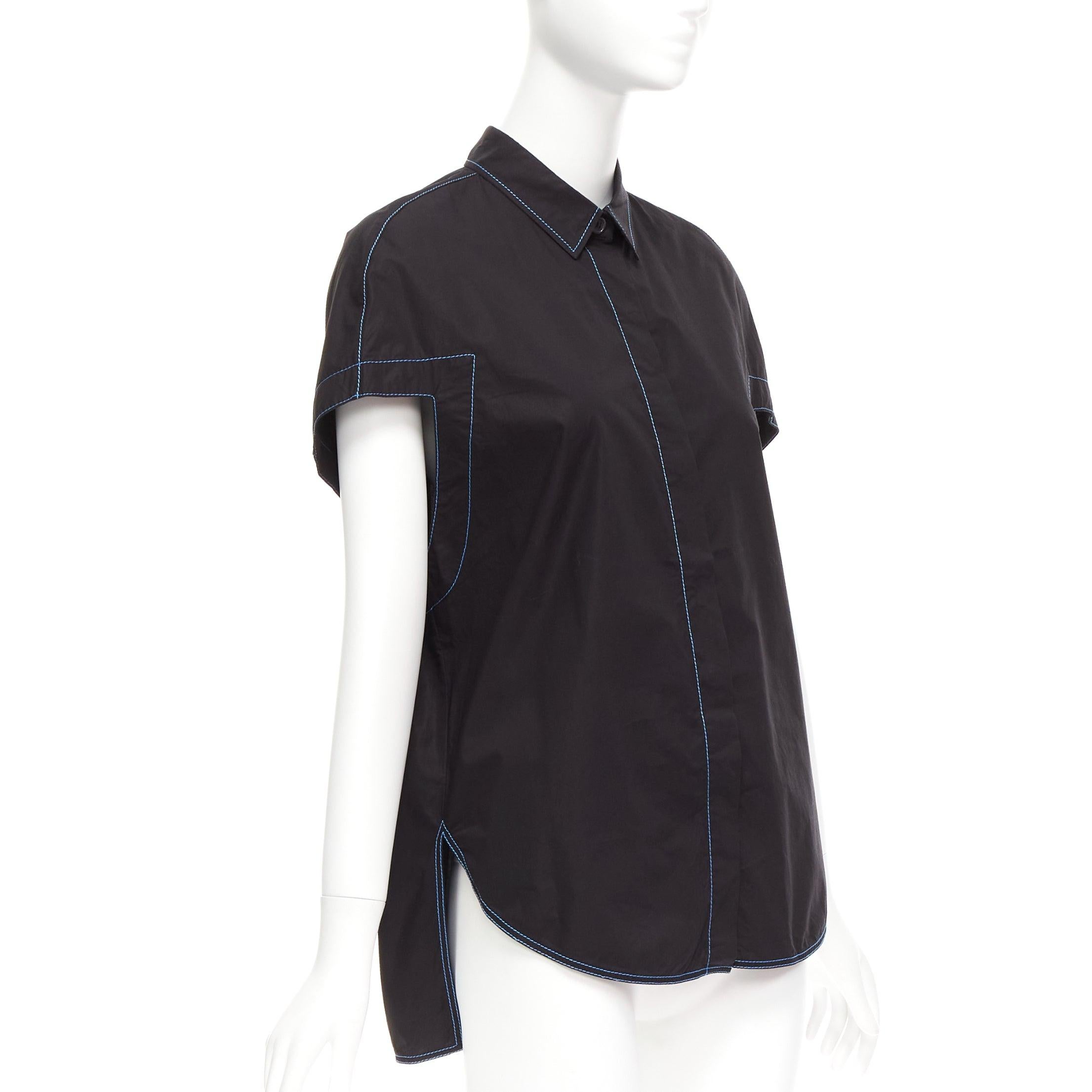 MARNI black blue topstitched round shoulder 3D cut boxy shirt IT40 S
Reference: CELG/A00330
Brand: Marni
Material: Cotton
Color: Black, Blue
Pattern: Solid
Closure: Button
Extra Details: Hidden placket. Angular armhole.
Made in: