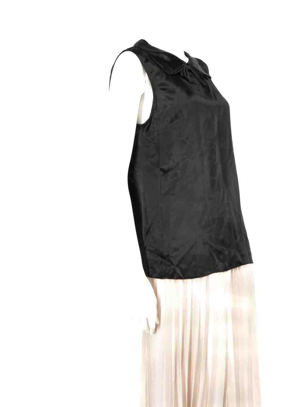 CONDITION is Very good. Hardly any visible wear to top is evident on this used Marni designer resale item.
 
 Details
 Winter 2011
 Black
 Synthetic
 Sleeveless top
 Round neckline
 Bow accent
 Collared
 Back keyhole neckline with button closure
 
