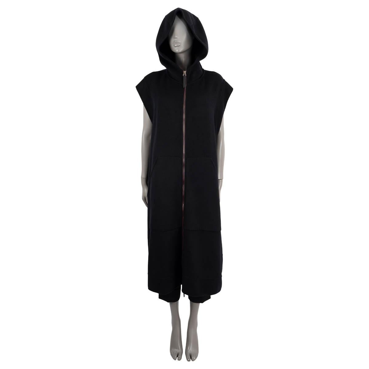 100% authentic Marni sleeveless long vest coat in black cashmere (98%) and polyamide (2%). Features a hood and kangaroo pockets at front. The zipper is trimmed in burgundy lambskin leather with a black leather zipper pull. Unlined. Has been worn and