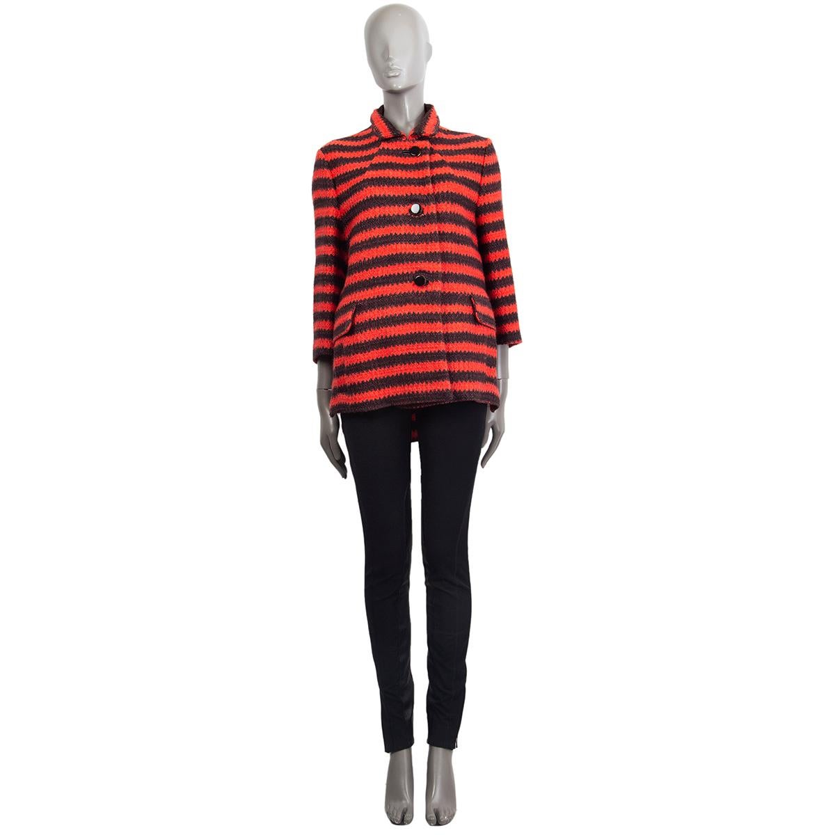 100% authentic Marni 3/4 sleeve striped knit coat in black and coral wool (74%), viscose (23%) and polyamide (3%) with front pockets. Closes on the front with pockets. Lined in acetate (65%) and silk (35%). Has been worn and is in excellent