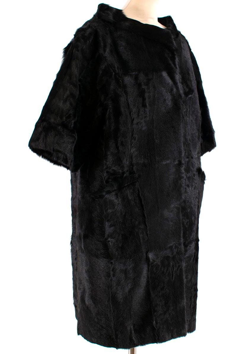 Marni Black Dankalia Kid Fur Short Sleeve Long Jacket  

- 2 patch pockets to front
- Popper fastening 
- Nylon woven lining
- Soft genuine fur

Made in Italy

Do not wash

