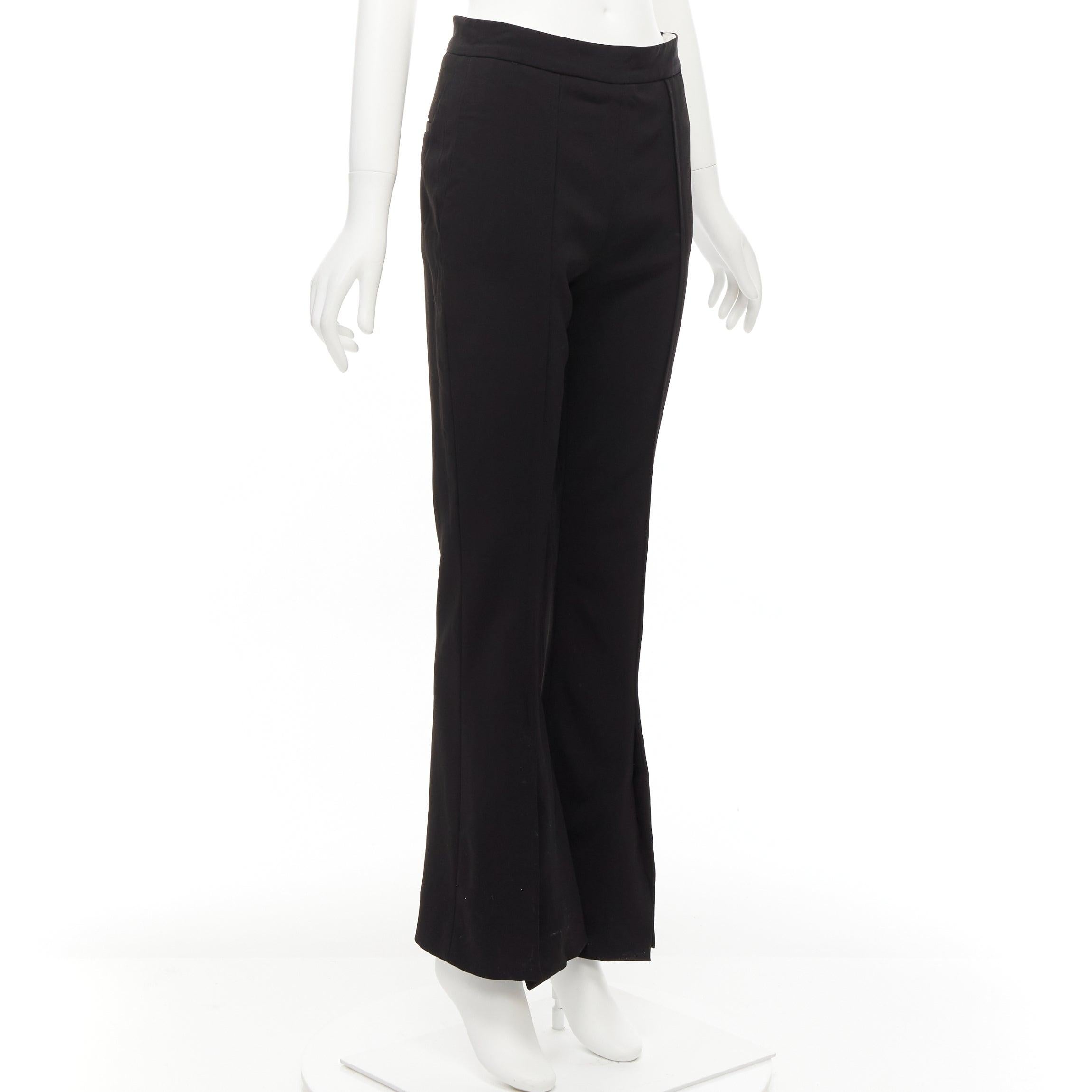 MARNI black front pleat slit hem minimal side zip flare trousers IT42 M
Reference: CELG/A00256
Brand: Marni
Material: Viscose, Blend
Color: Black, Gold
Pattern: Solid
Closure: Zip
Extra Details: Side gold zip.
Made in: Italy

CONDITION:
Condition: