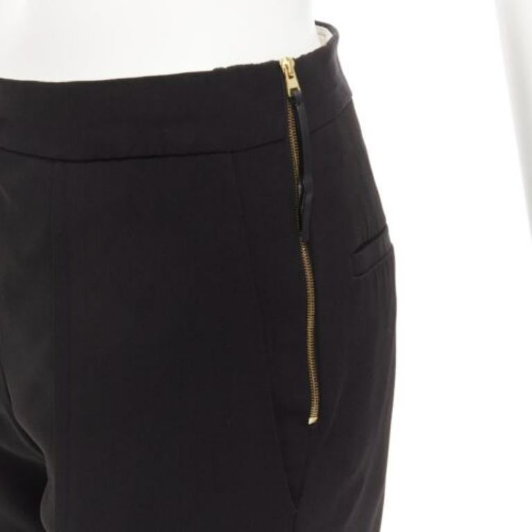 MARNI pantalon évasé noir à plis sur le devant, avec fente à l'ourlet et fermeture éclair sur le côté IT42 M
Référence : CELG/A00256
Marque : Marni
MATERIAL : Viscose, mélange
Couleur : noir, or
Motif : Solide
Fermeture : Zip
Détails supplémentaires