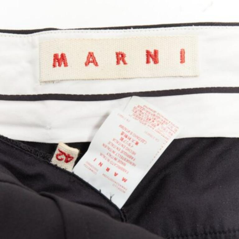 MARNI pantalon évasé noir à plis sur le devant, avec fente à l'ourlet et fermeture éclair sur le côté IT42 M en vente 3