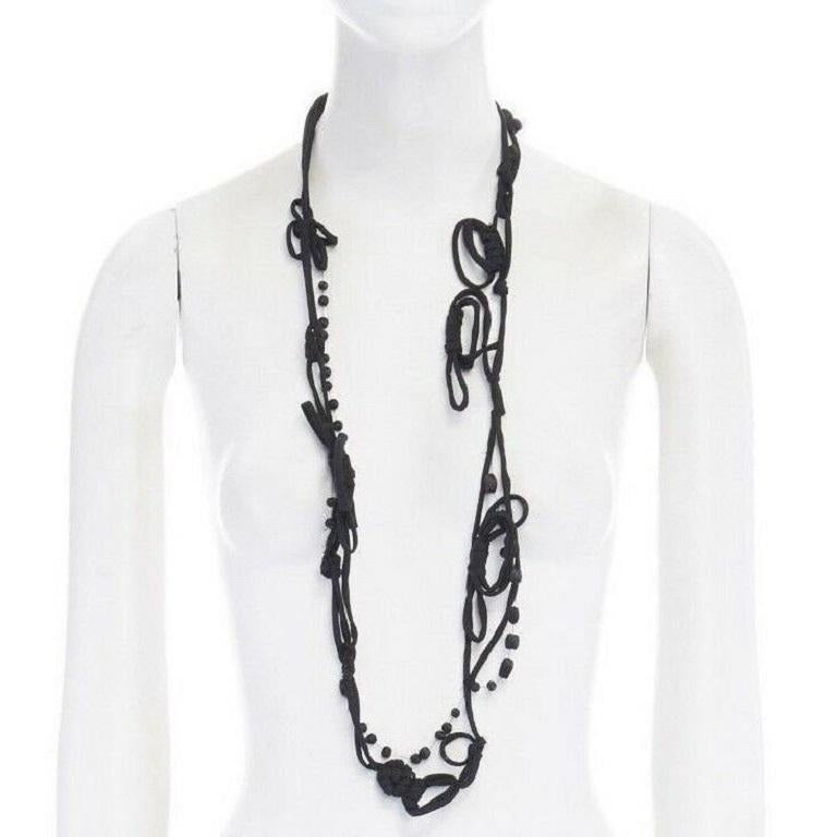 MARNI black knot tie ribbon bead embellished casual statement necklace 
Brand: Marni
Model Name / Style: Fabric necklace
Material: Fabric
Color: Black
Pattern: Solid
Extra Detail: Knotted necklace.

CONDITION: 
Condition: Excellent, this item was